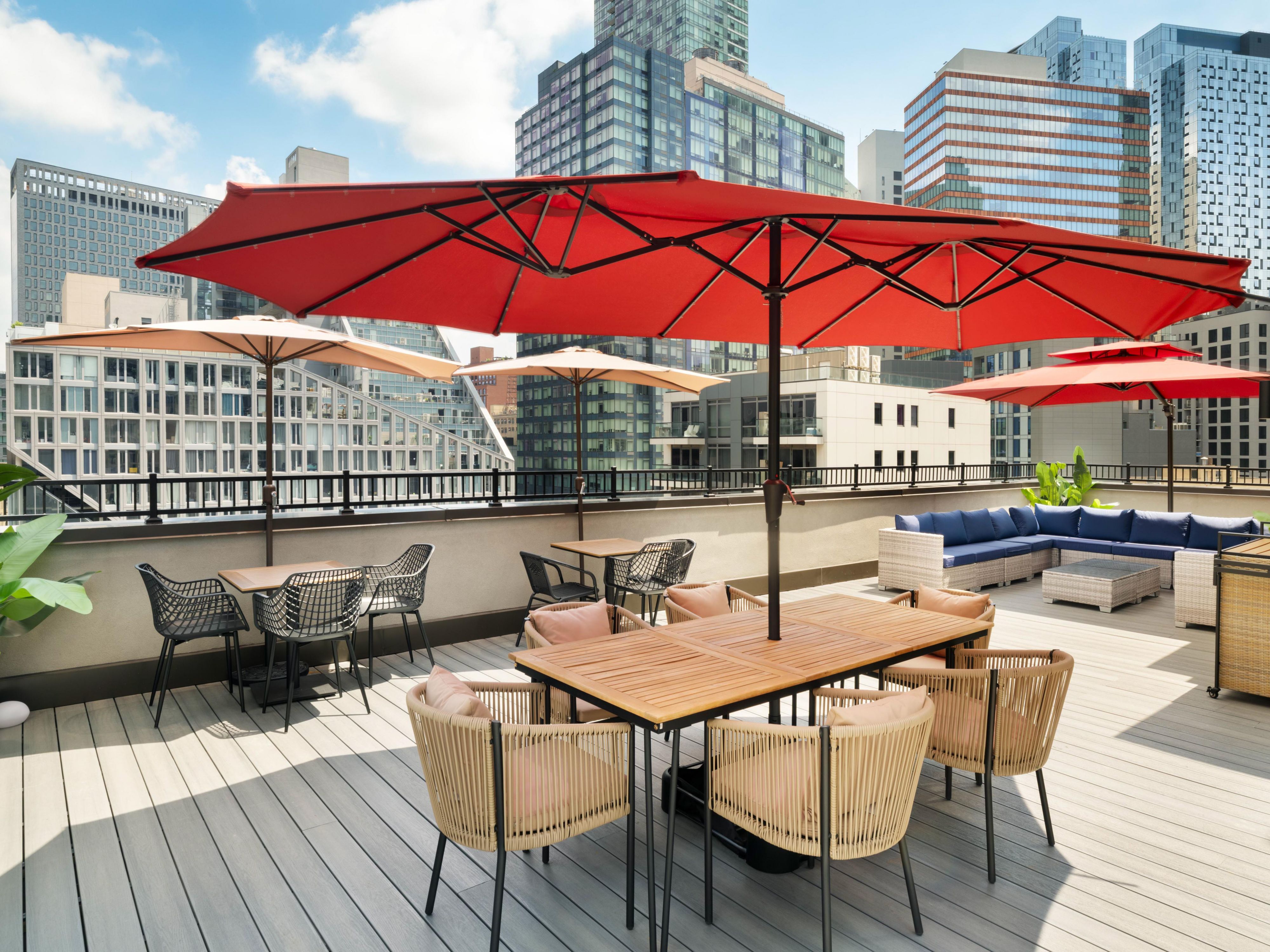 Unwind at EVEN Hotel Long Island City's rooftop Sky Lounge & Bar, offering stunning city views and crafted cocktails in a vibrant setting. For convenience, our 24-hour market stocks fresh salads, sandwiches, snacks, and essentials anytime you need.