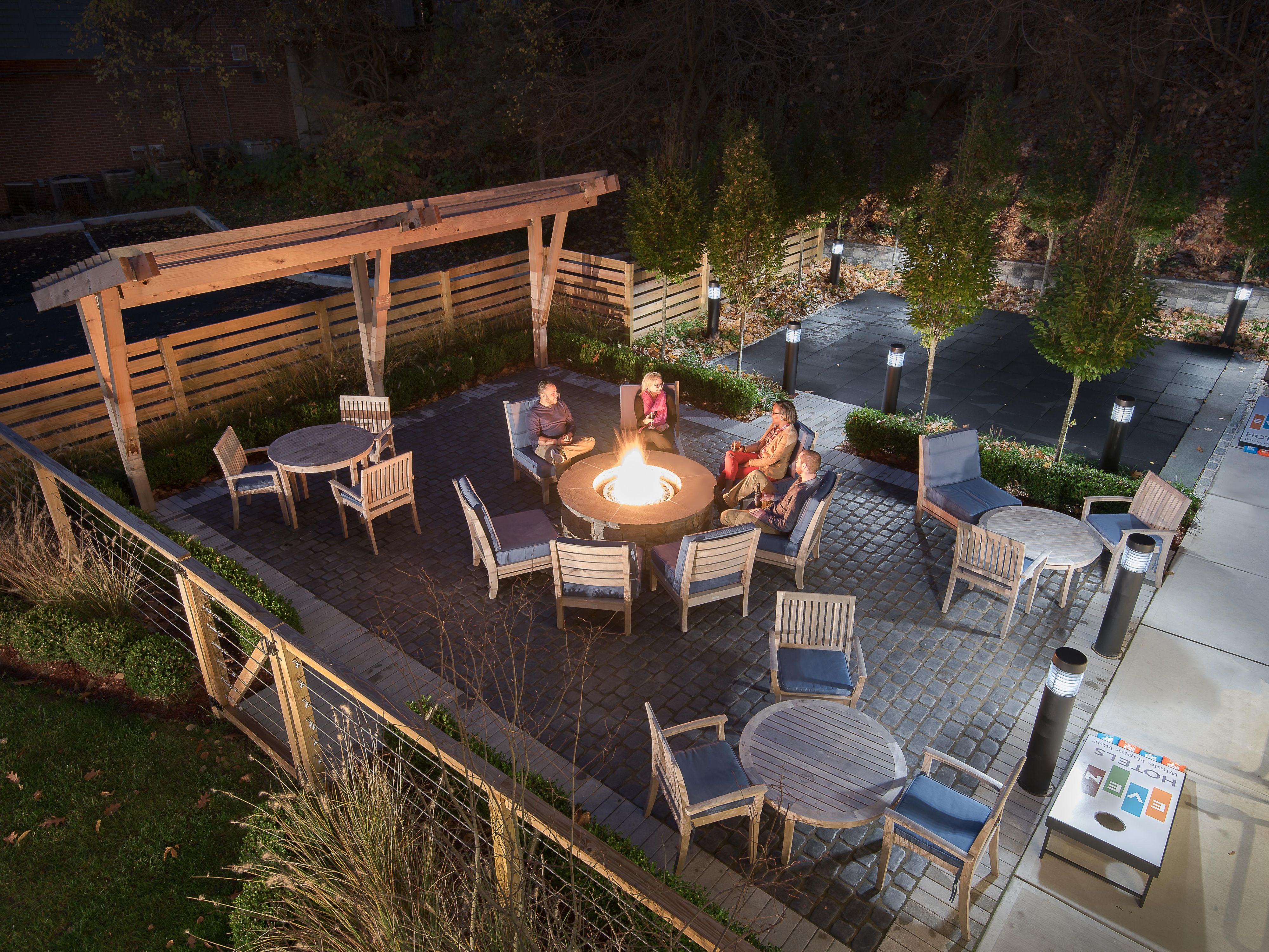Enjoy a cocktail out on our hotel's welcoming outdoor patio. Comfortable lounge chairs and fire pits are available 24/7 so you can relax and enjoy the pleasant sights and weather throughout your stay. Trees, shrubs, low stone walls, and a shaded arbor offer a beautiful space to take in Norwalk's fresh air.​