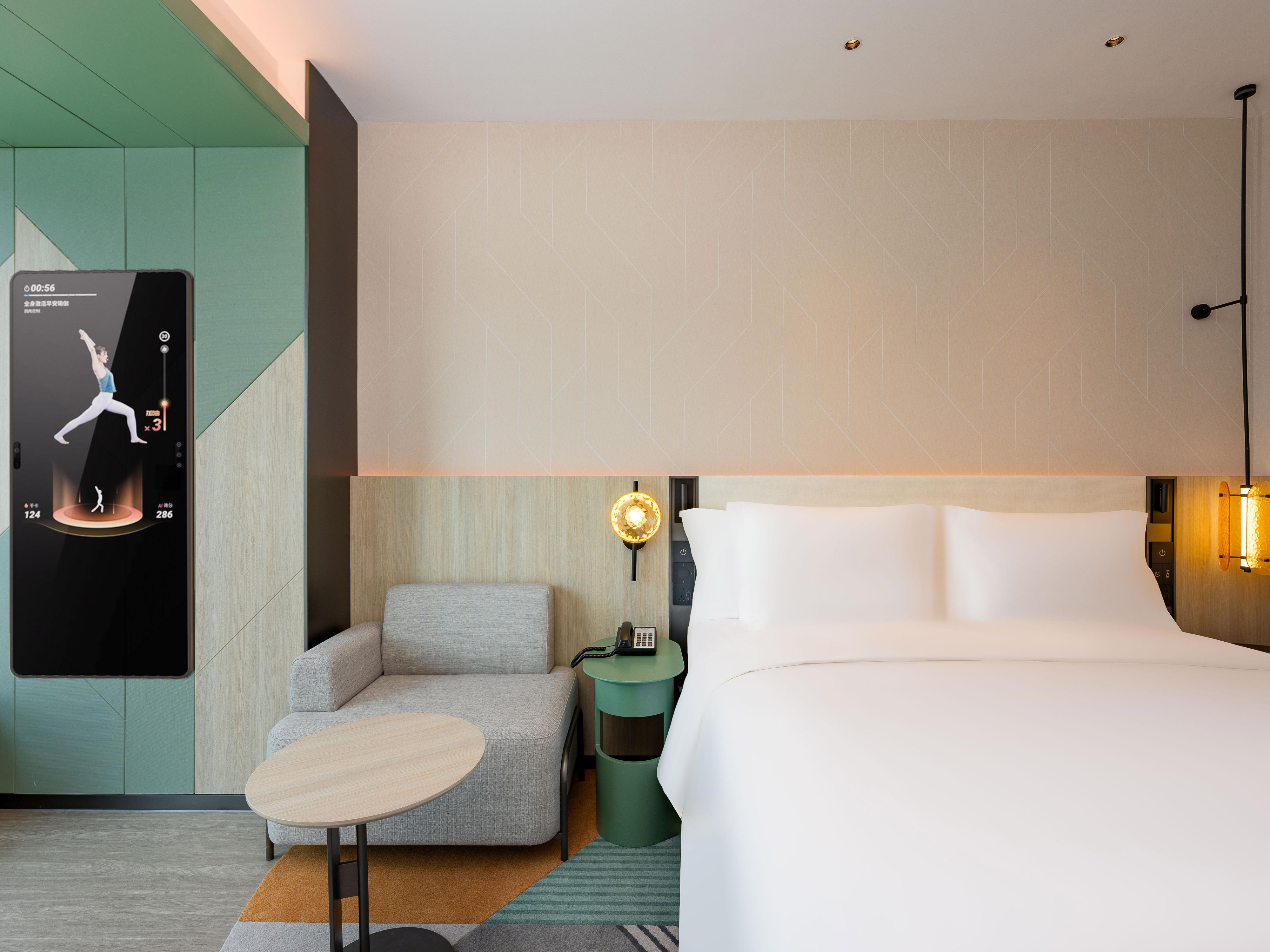 酒店客房有一个百度智能魔镜，他可以根据你发出的指令，健身、体感游戏、播放歌曲等