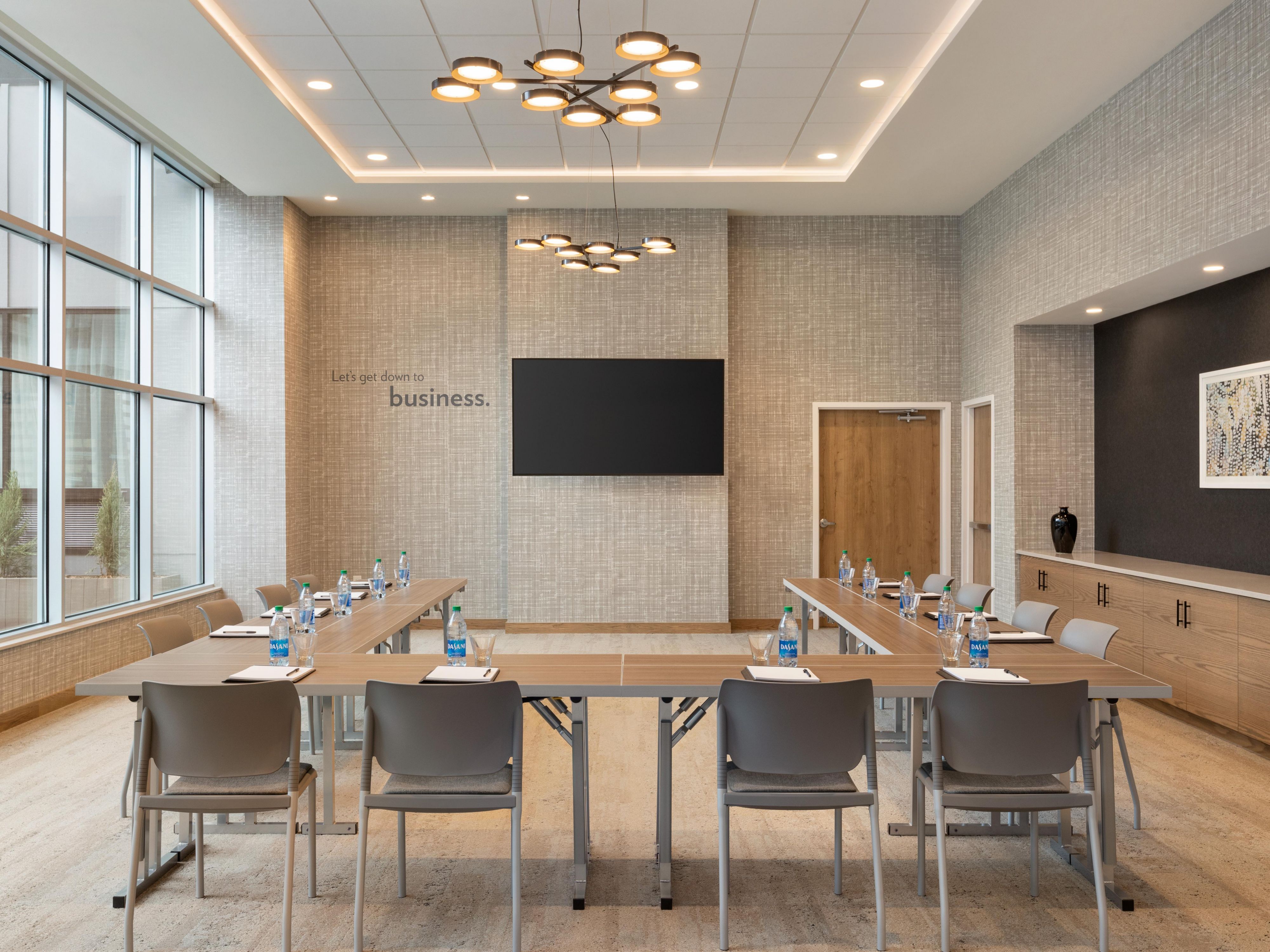 Event space with conference table and A/V equipment.