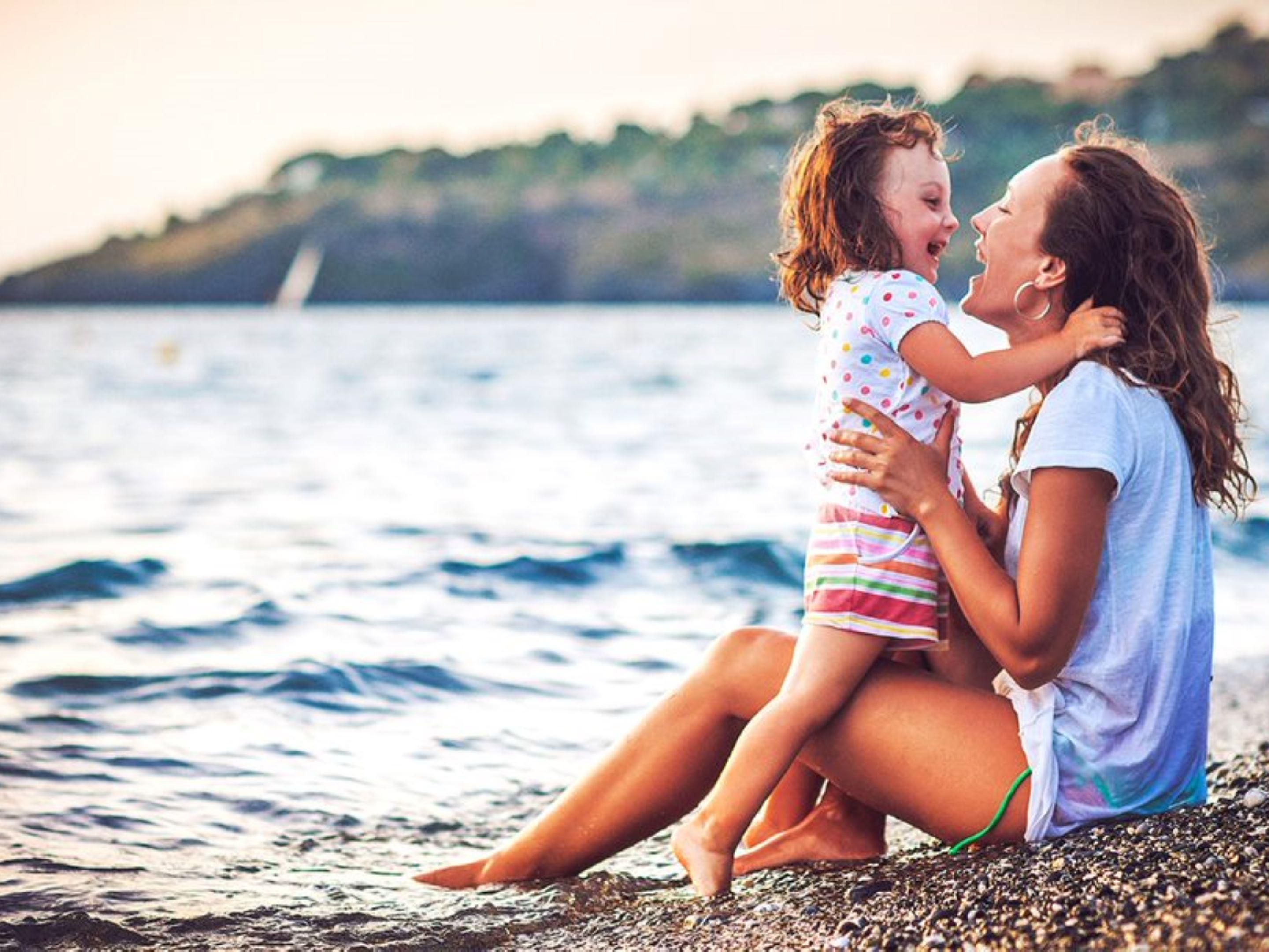 Mother and daughter on the beach
