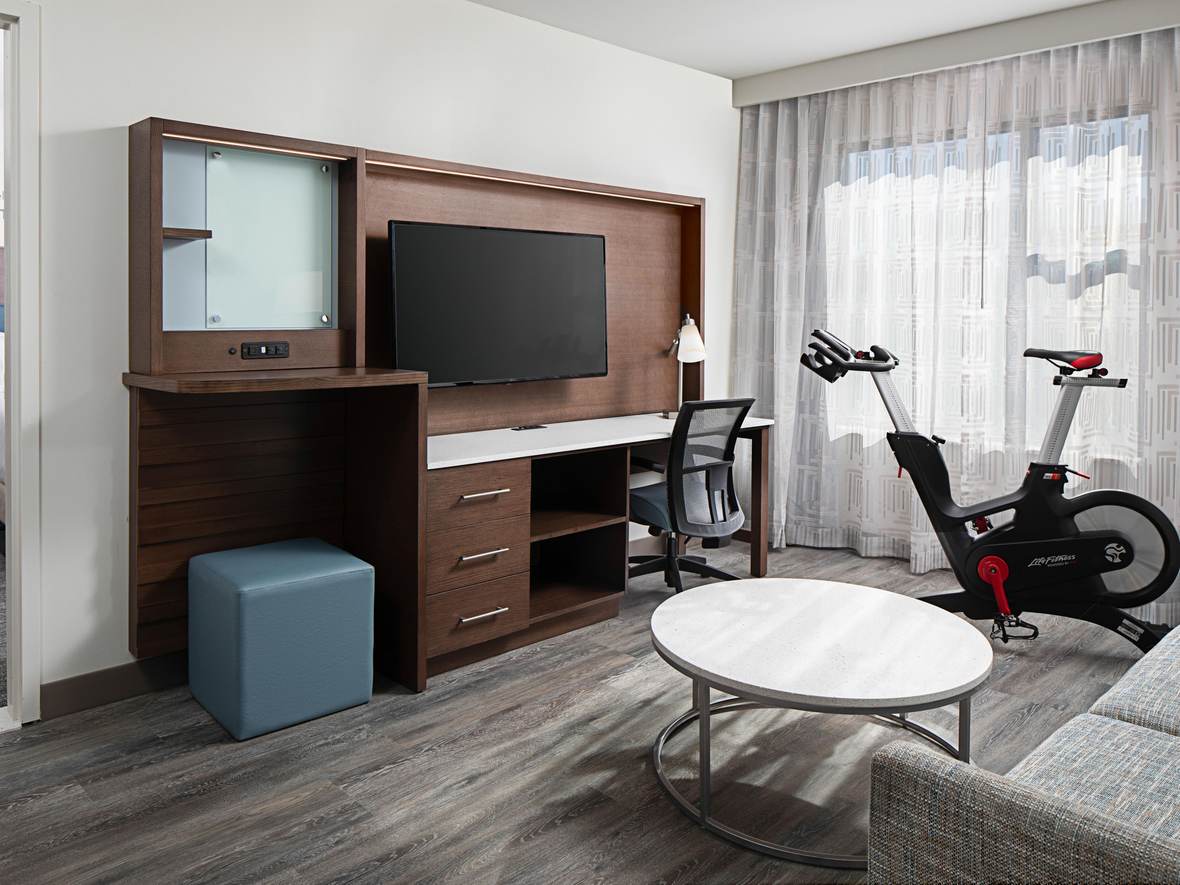 Our guest rooms are spacious with in-room fitness equipment.