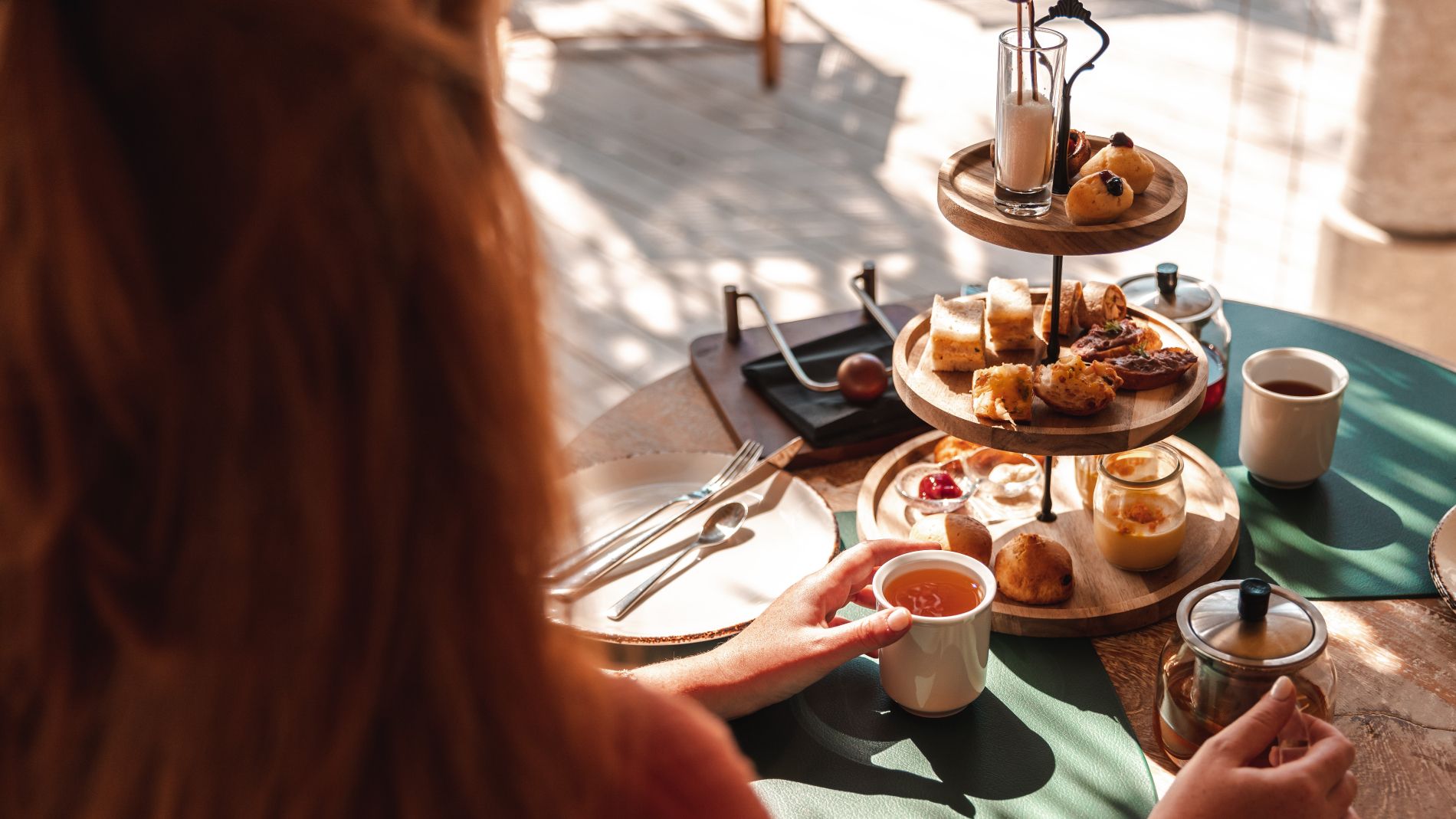 Hotel guest enjoying pastries