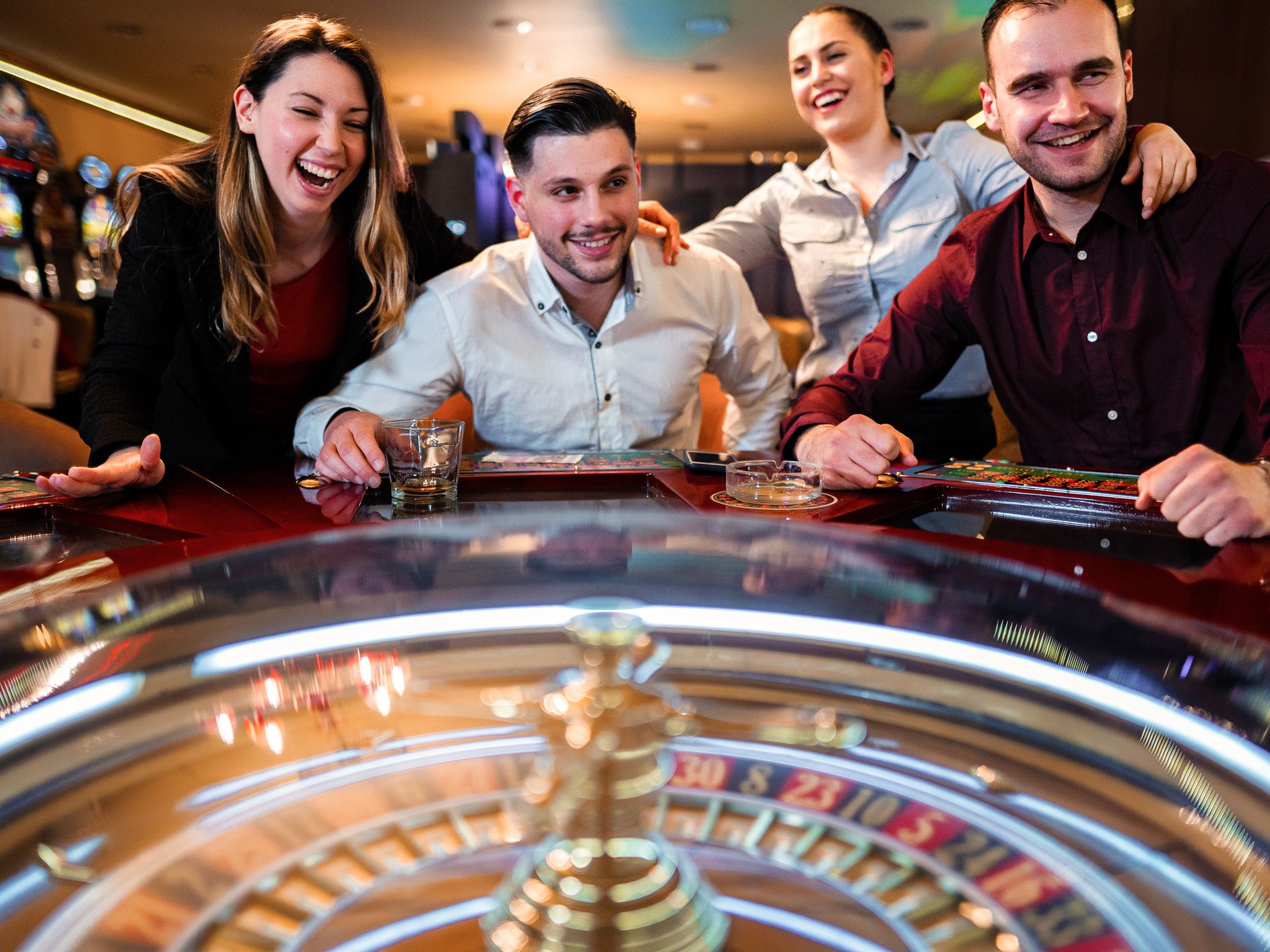 Friends playing games at a casino