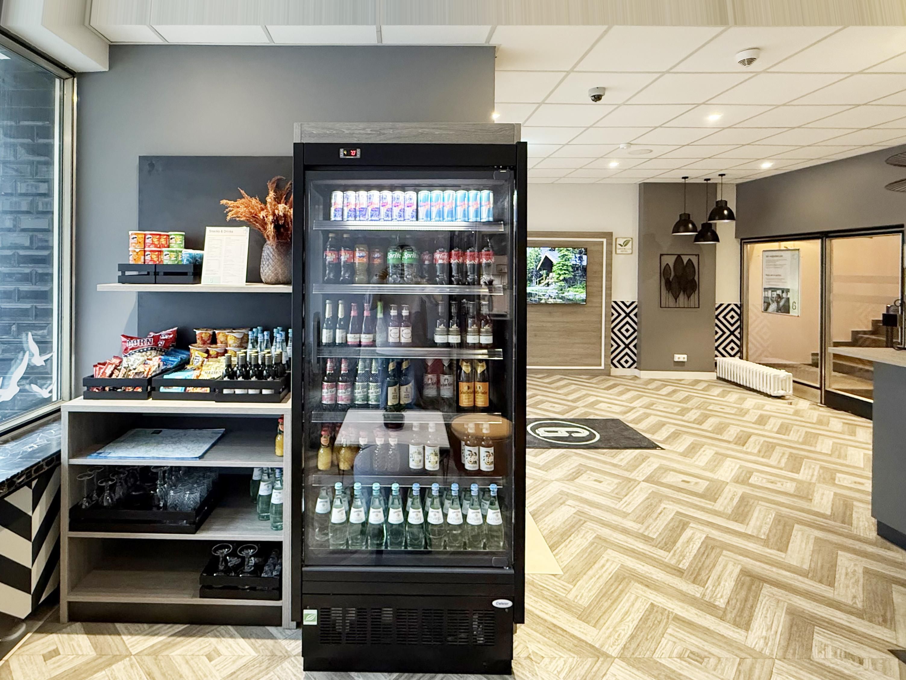 Enjoy tasty snacks in our stylish hotel lobby in central Berlin