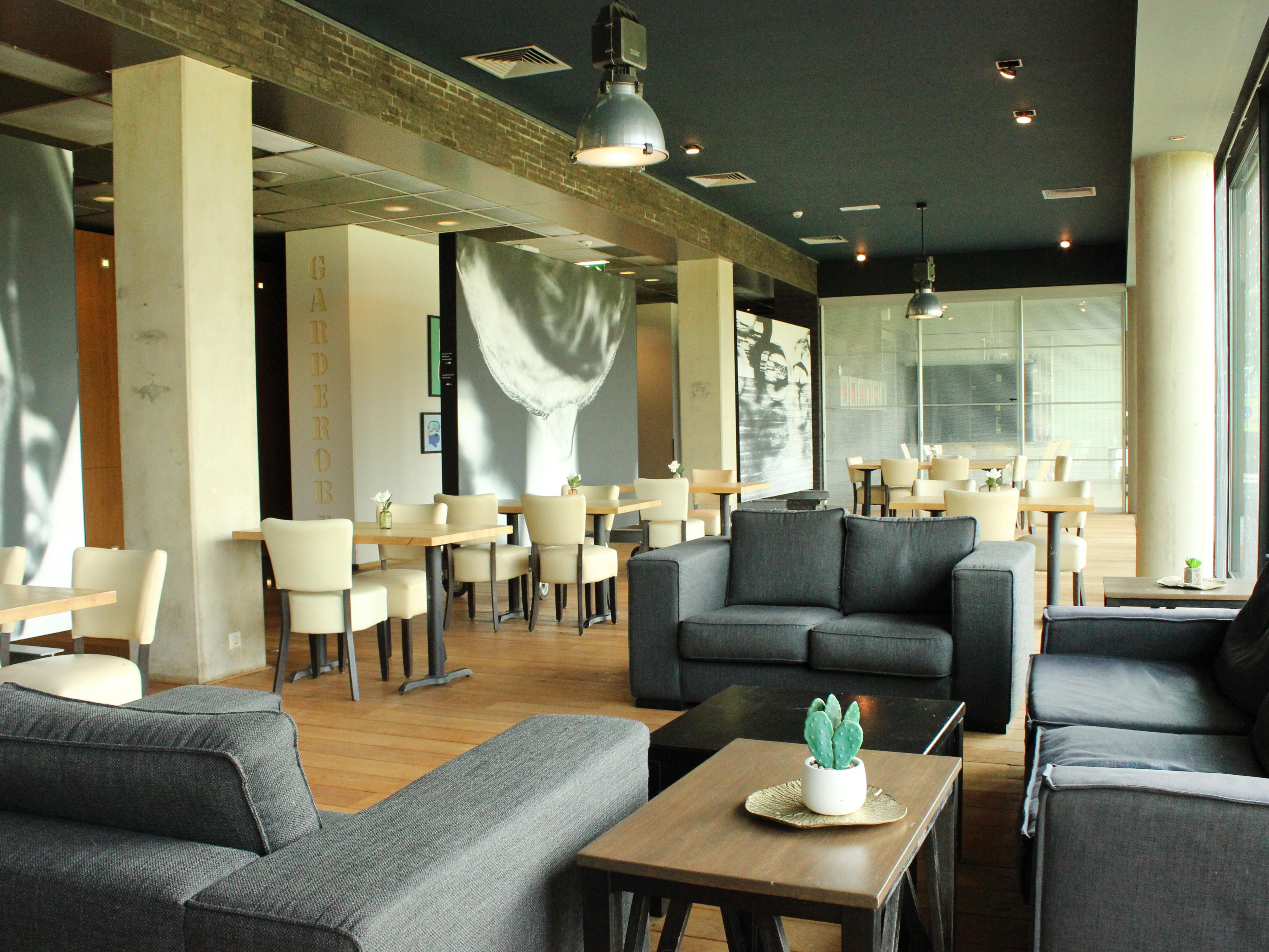 Our modern lobby lounge is your spot to meet and mingle