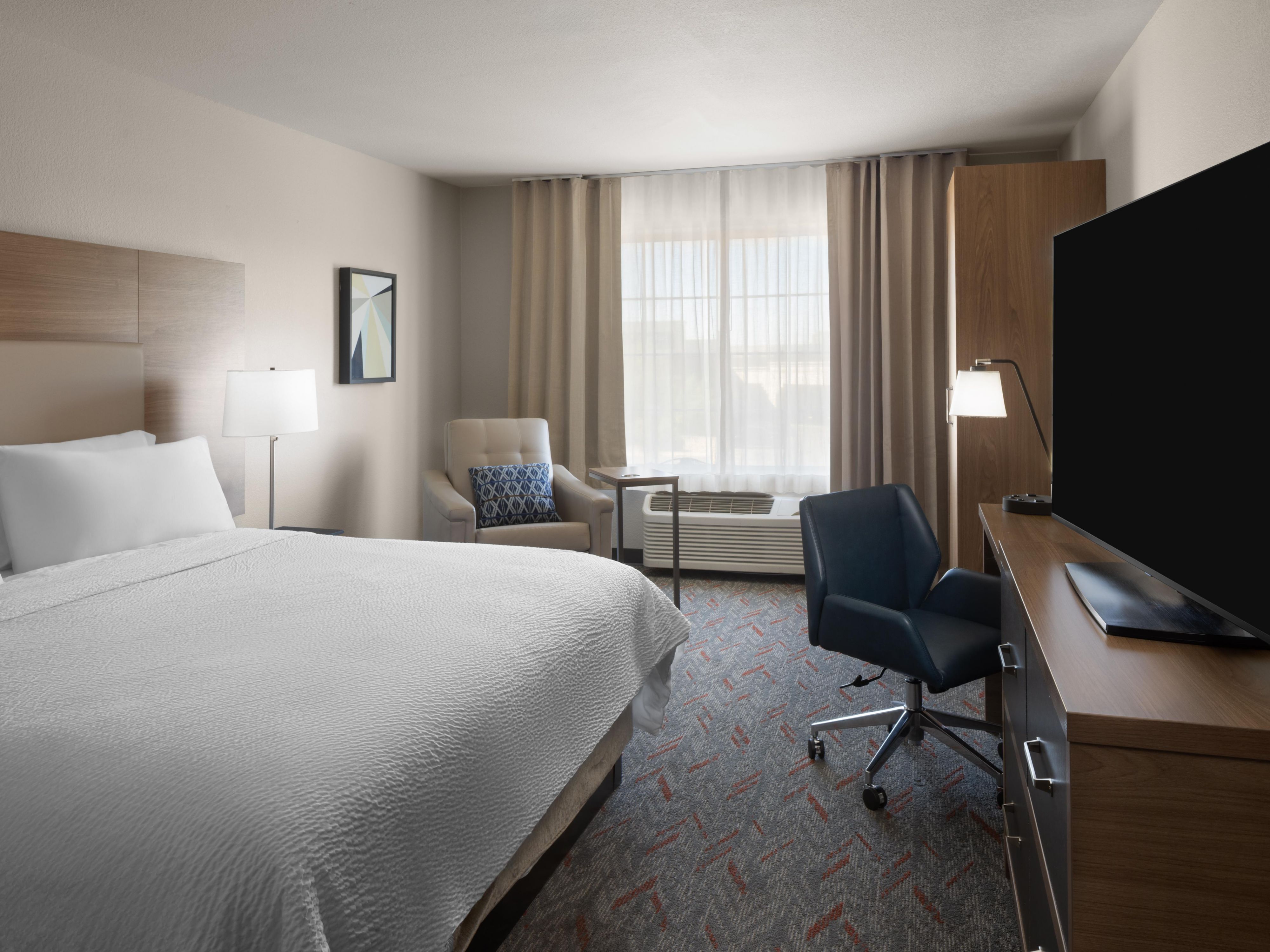 Pull back the covers, hop in, and catch your favorite TV show.