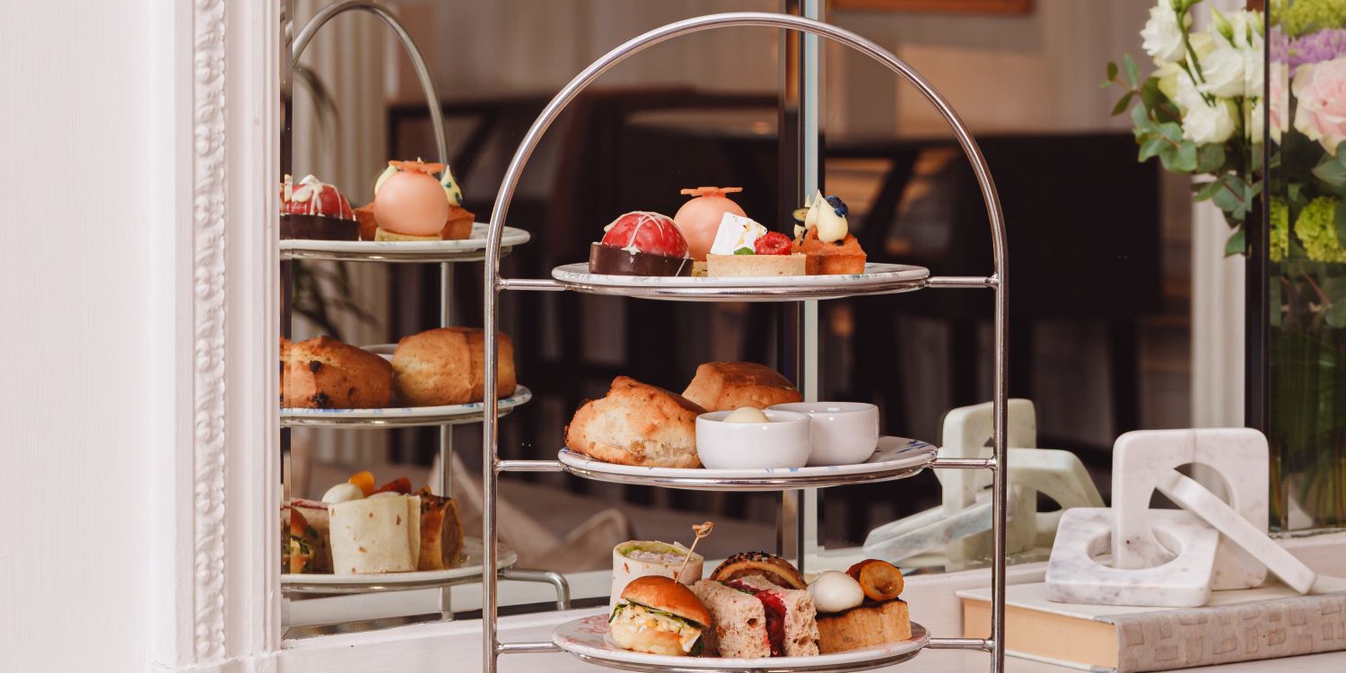 afternoon tea with three tiered stand complete with small delights