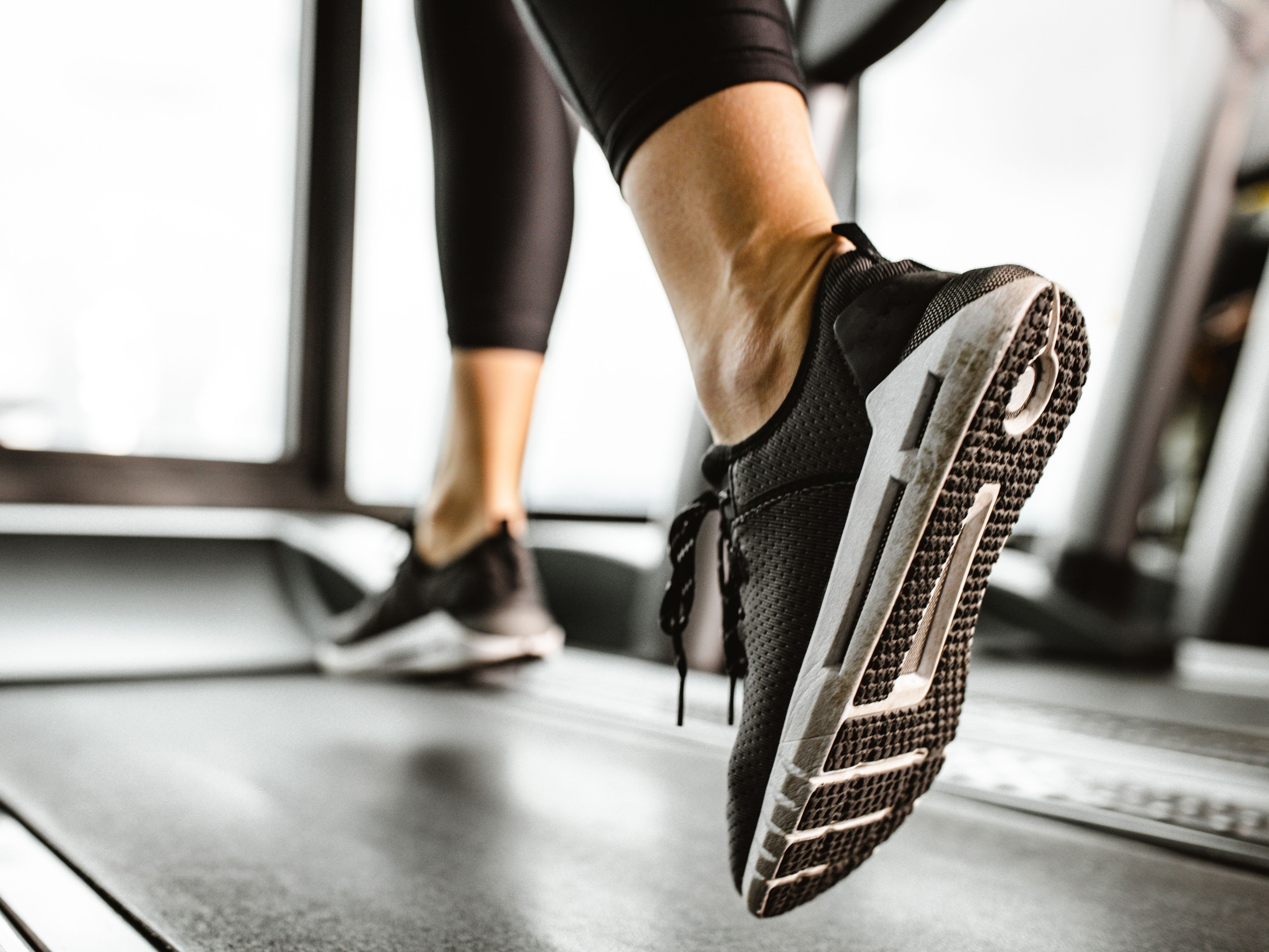 Feet running on a treadmil