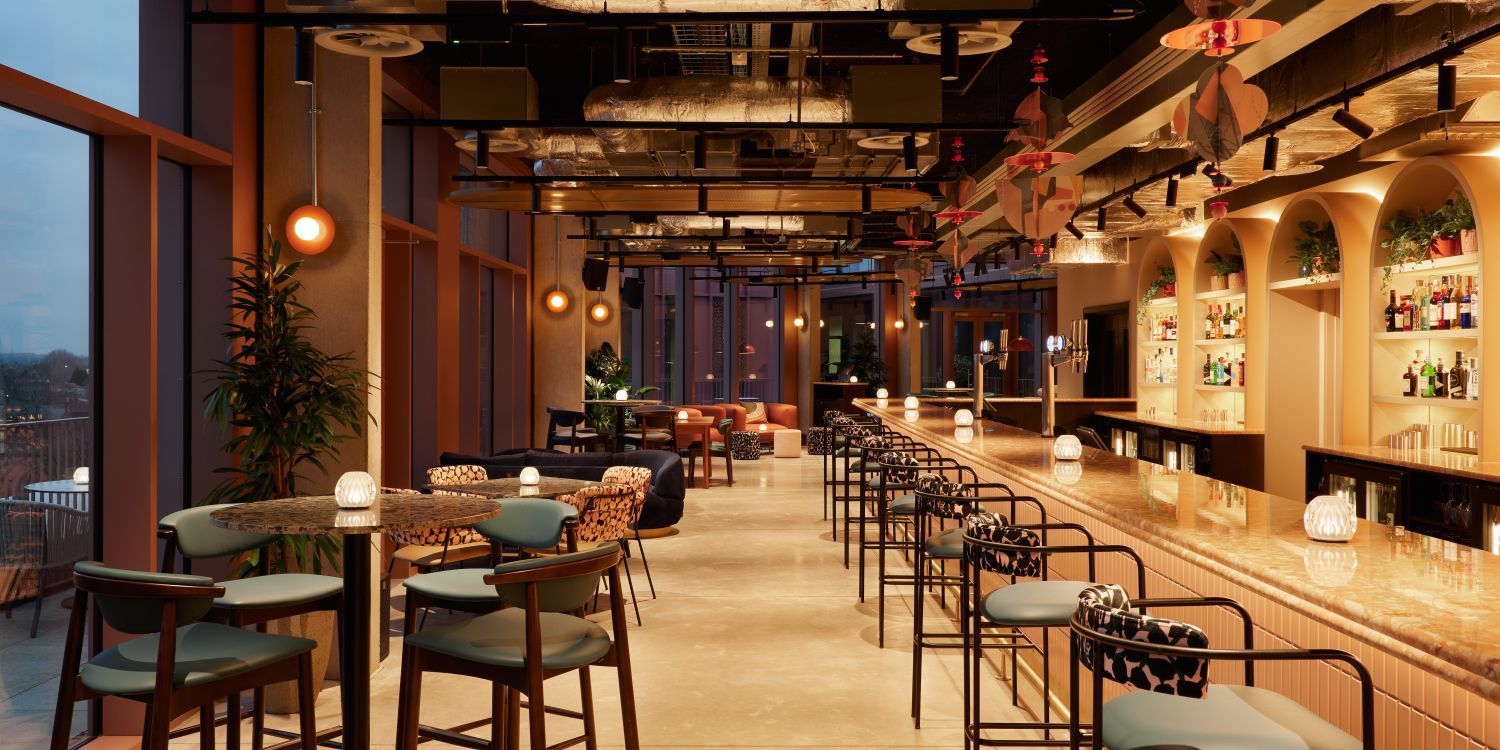 crimson spire dining and bar area with mood lighting