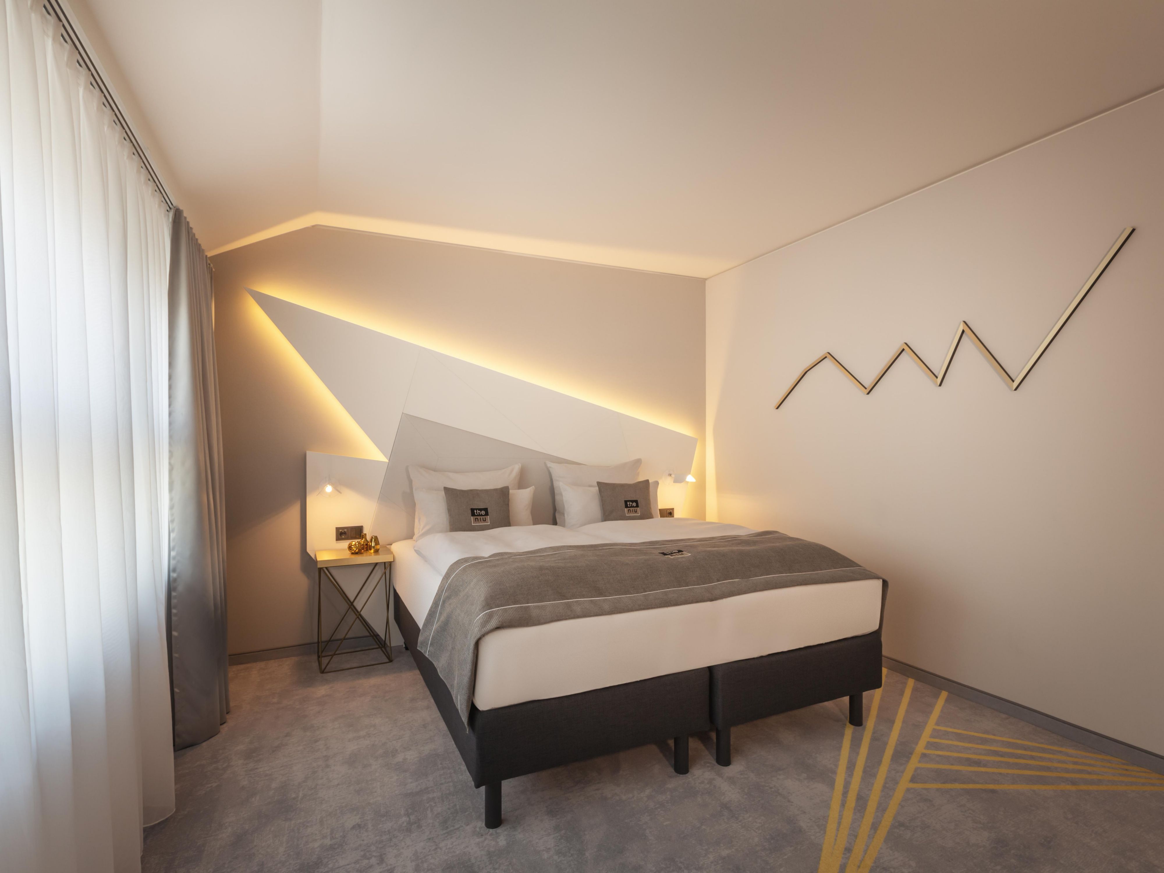 Stylishly lit room with stock market graphics as a design element