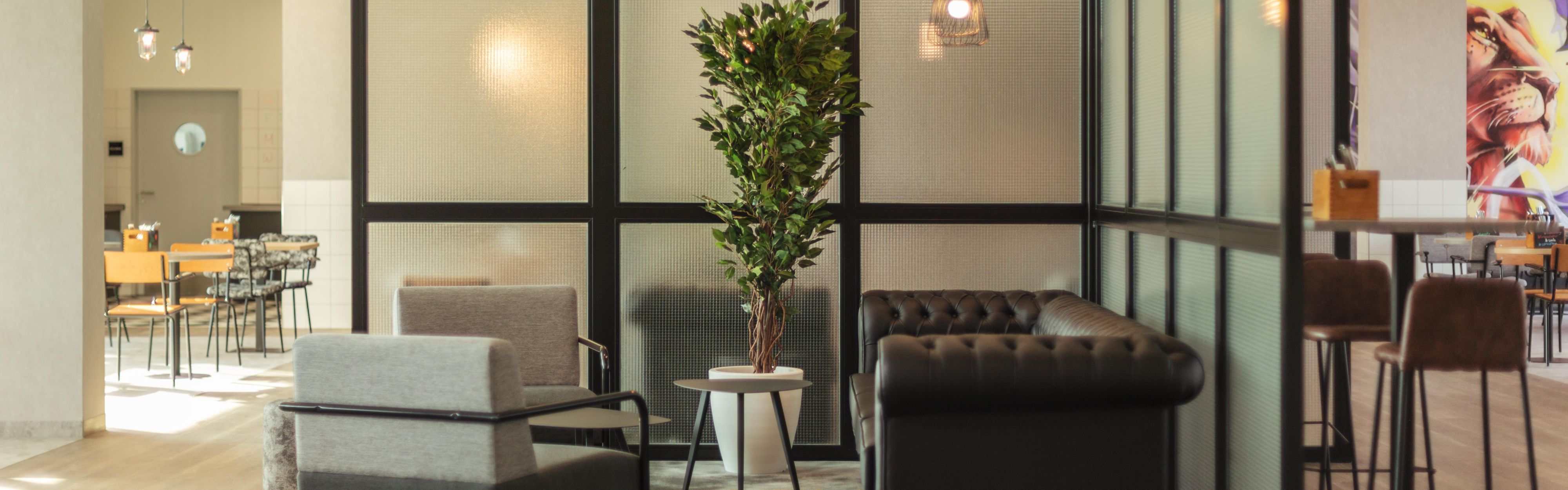 Lobby with free WiFi, comfy furniture and co-working spaces.