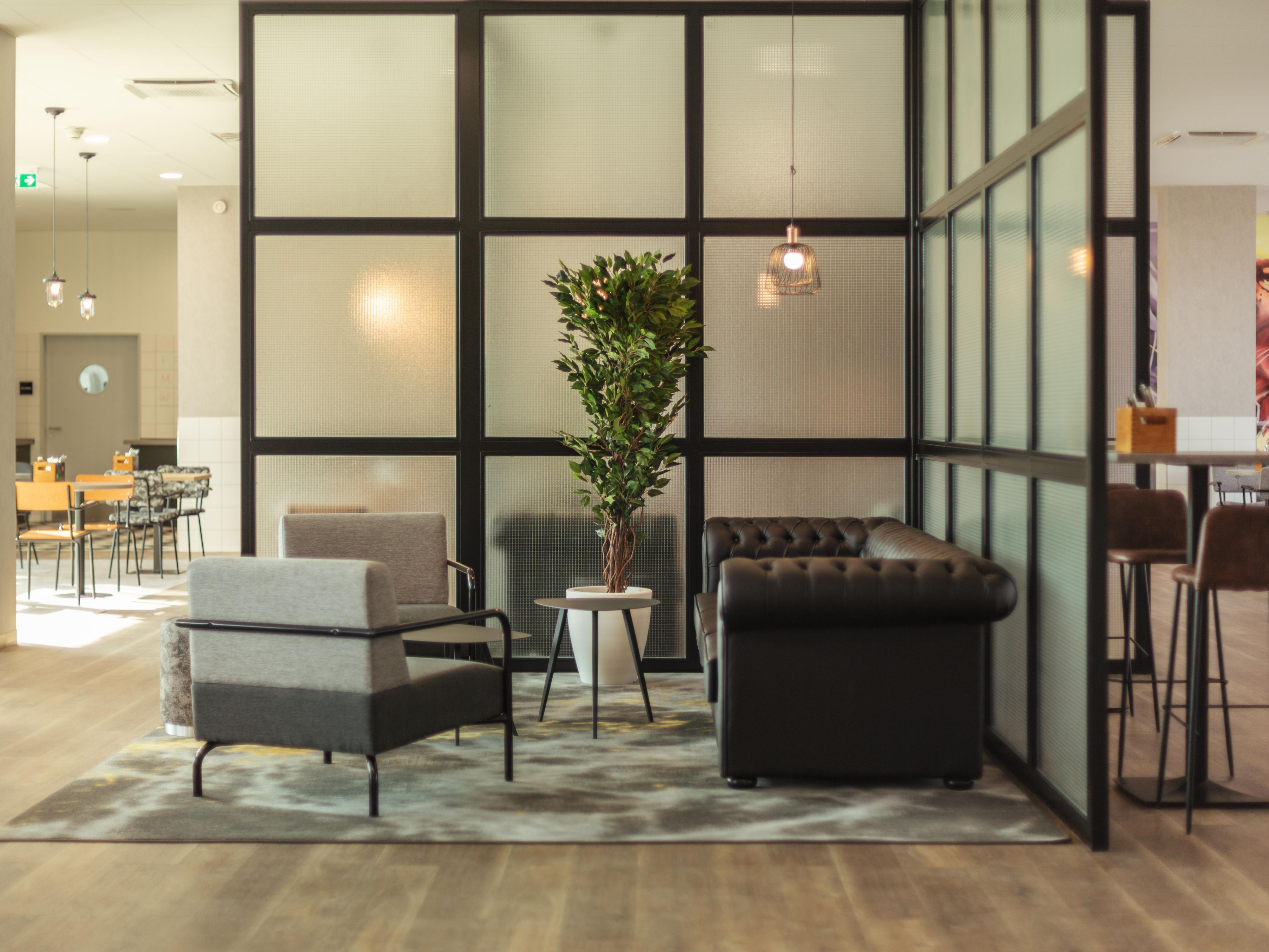 Lobby with free WiFi, comfy furniture and co-working spaces.