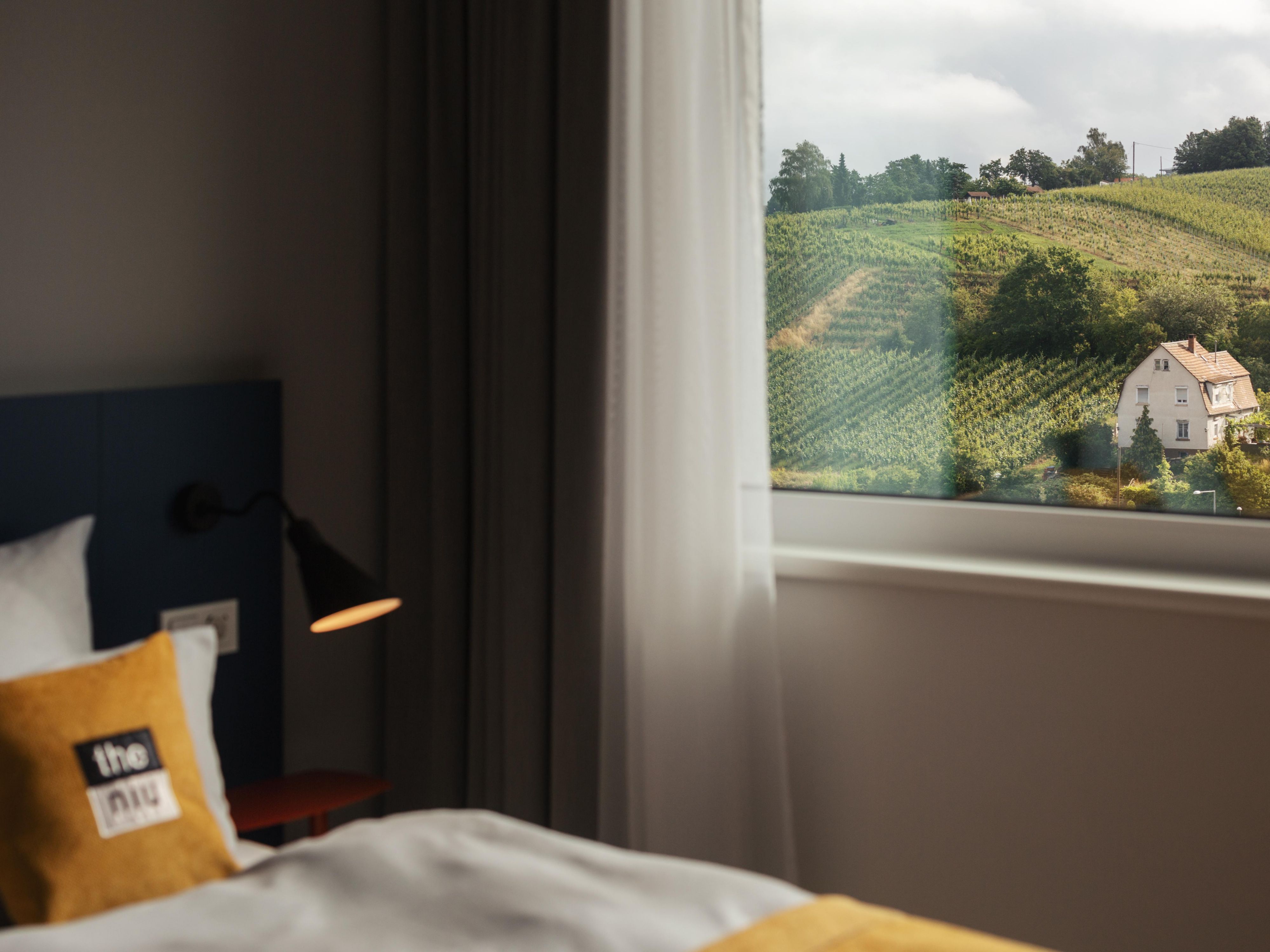 Discover the exclusive 9th floor of our hotel, available only to members! Enjoy the breathtaking view of Stuttgart or the picturesque landscape of Ludwigsburg. Start your day with freshly brewed coffee from our coffee machine and indulge in high-quality bathroom amenities. Experience comfort and style all in one.