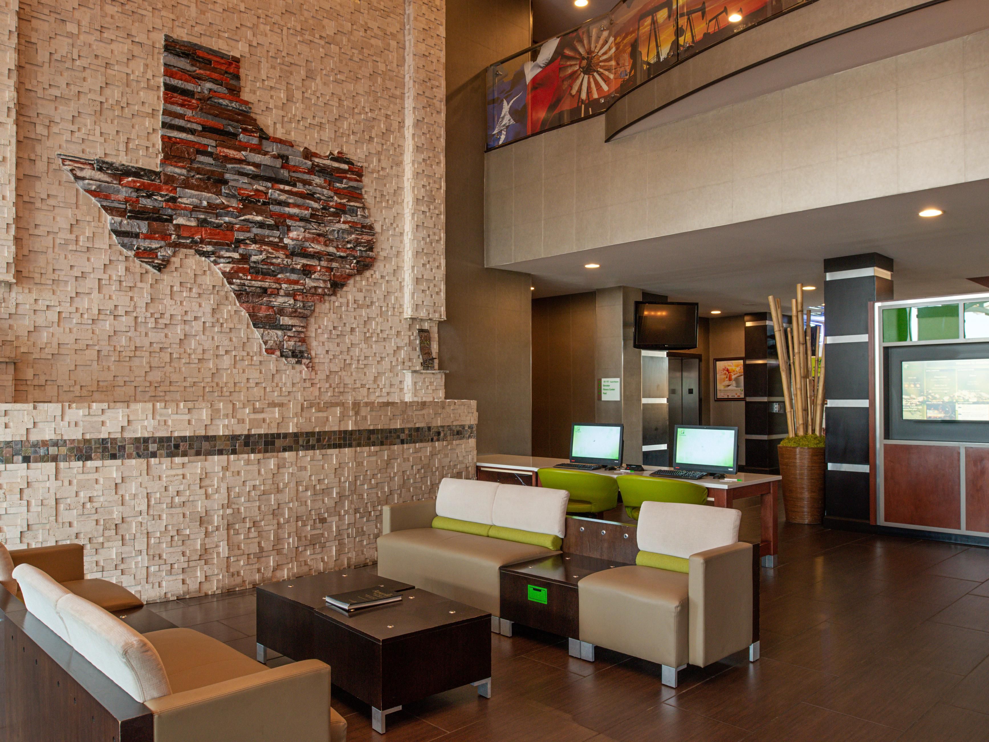 One of the first things you’ll notice when you walk in the door is our spacious, open lobby area with a Texas flair. There’s a space for co-working, chairs for relaxing, and a TV to keep you entertained. We look forward to giving you a Texas-sized welcome! 