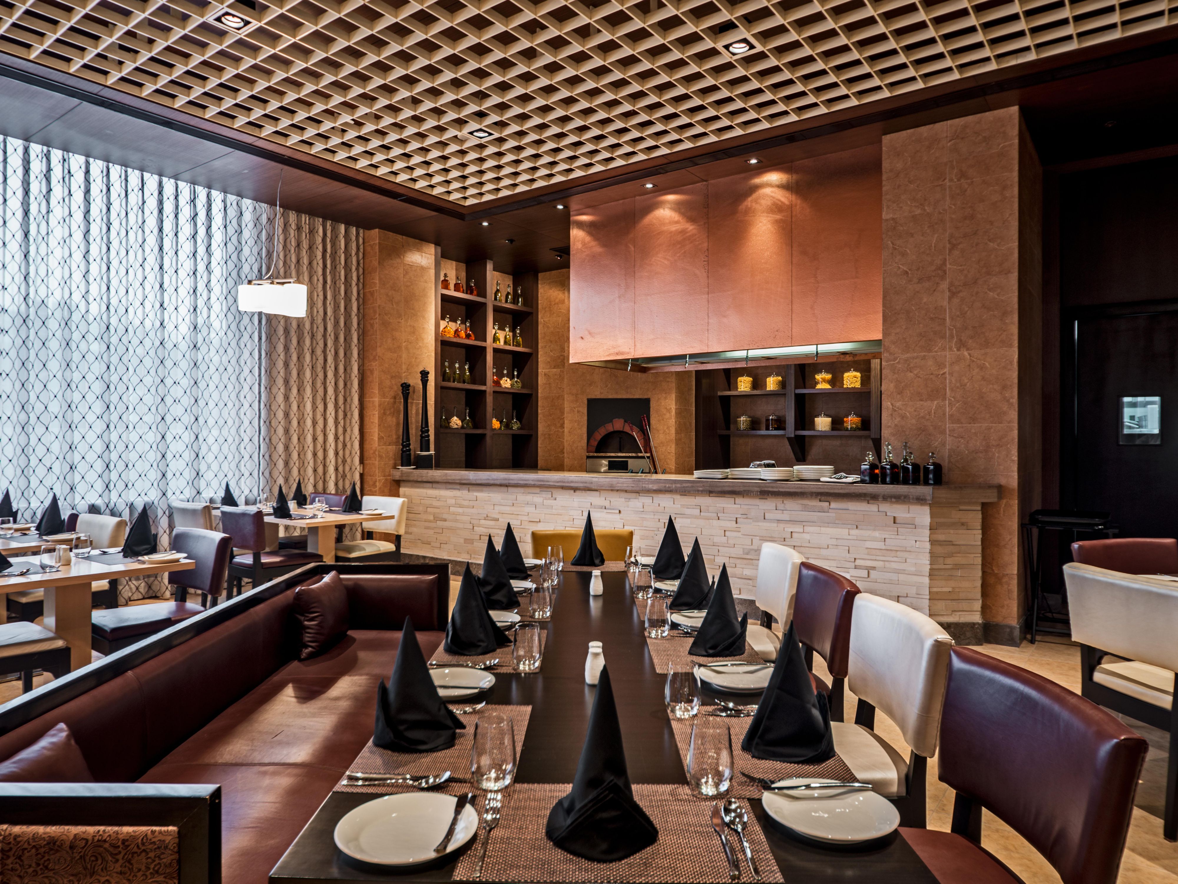 Are you a fan of Pan Asian and Italian food? If so, Bell A Sia is the place for you. Enjoy mouth-watering, authentic Pan Asian and Italian food in an intimate and inviting setting. The restaurant features a traditional wood-fired pizza oven and showcases the best of what Italian cuisine has to offer, along with delectable preparations from Asia. 