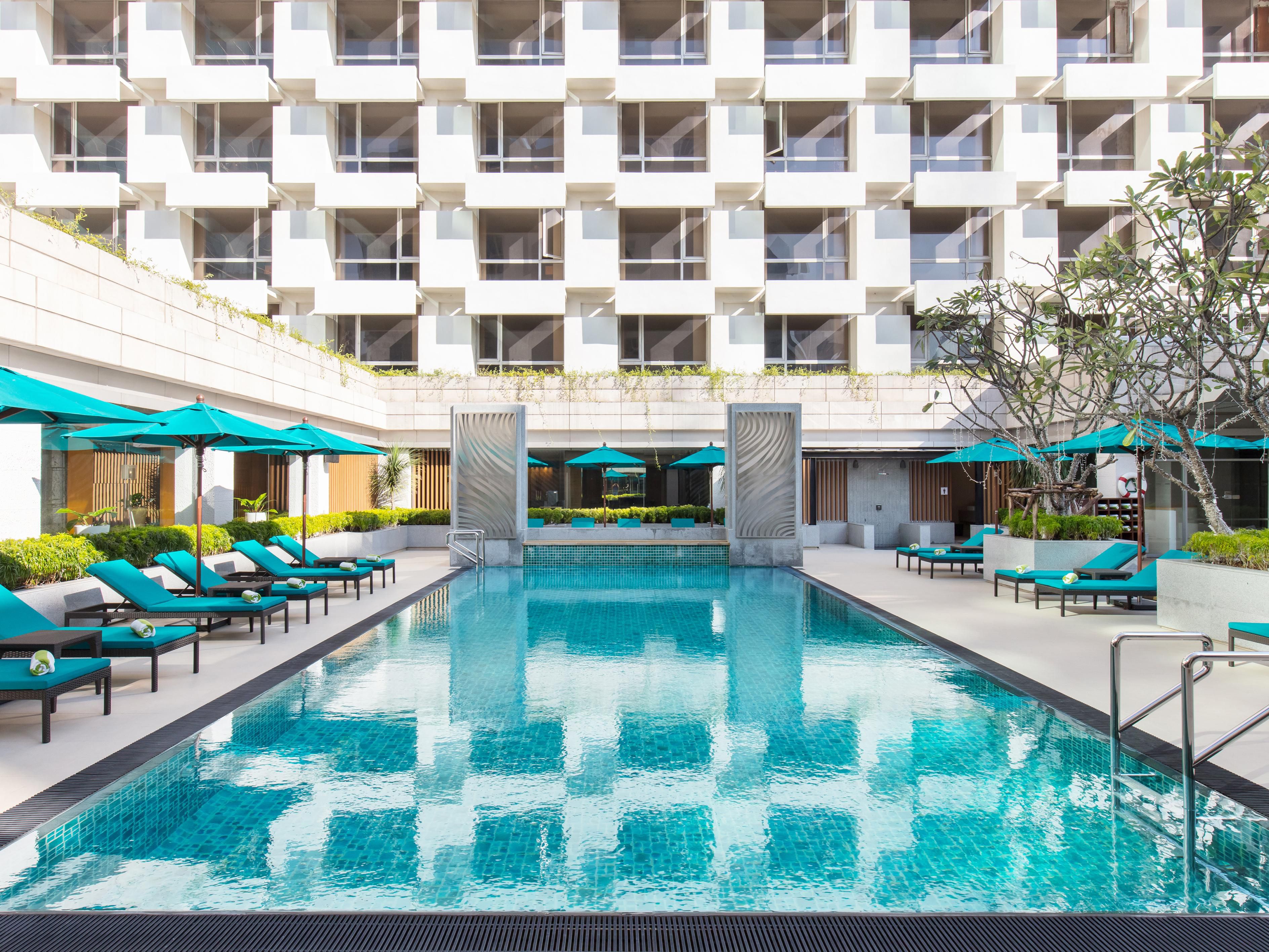 Soak up the sun from our hotel swimming pool in Bangkok