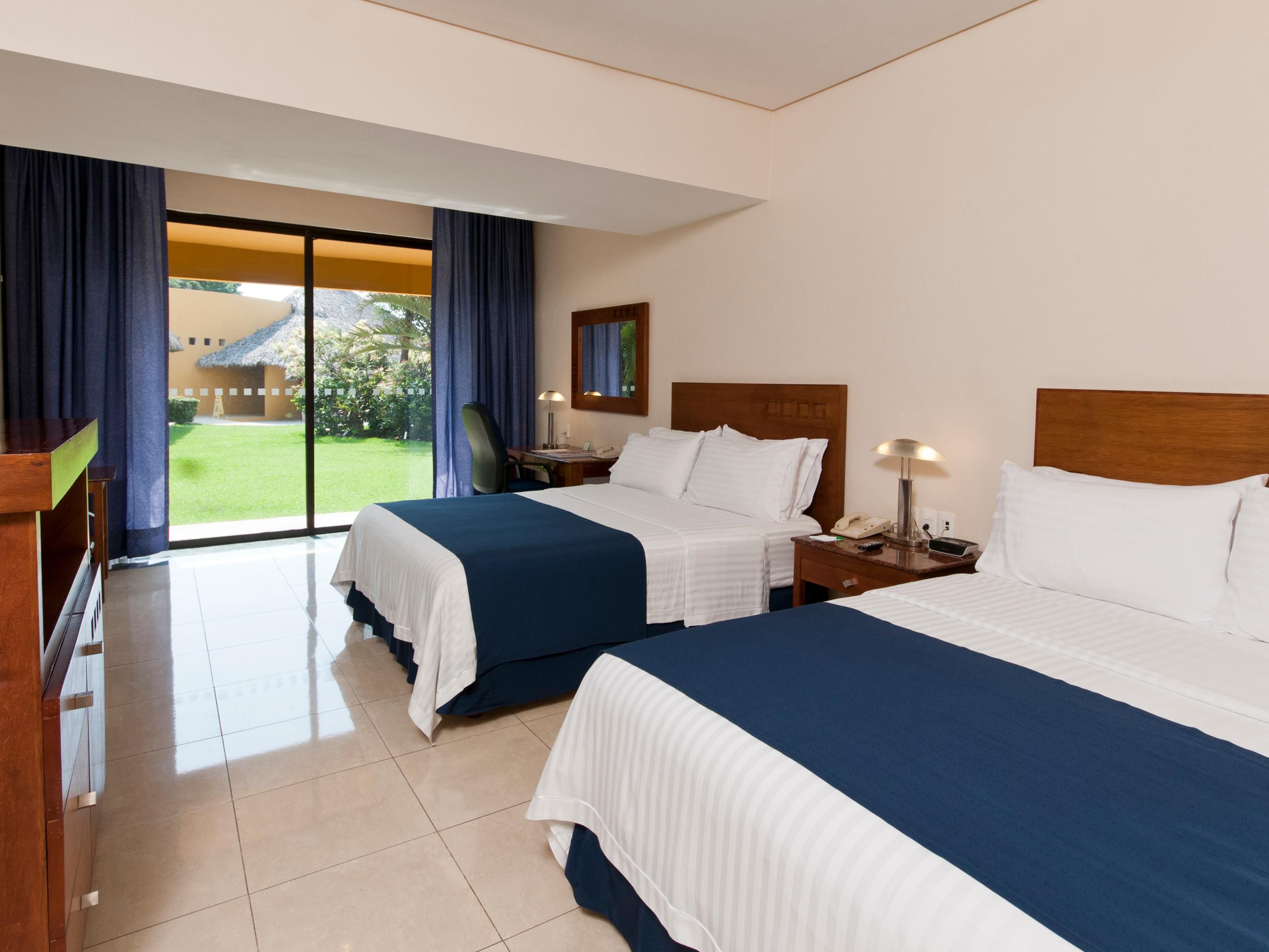 two double beds poolside