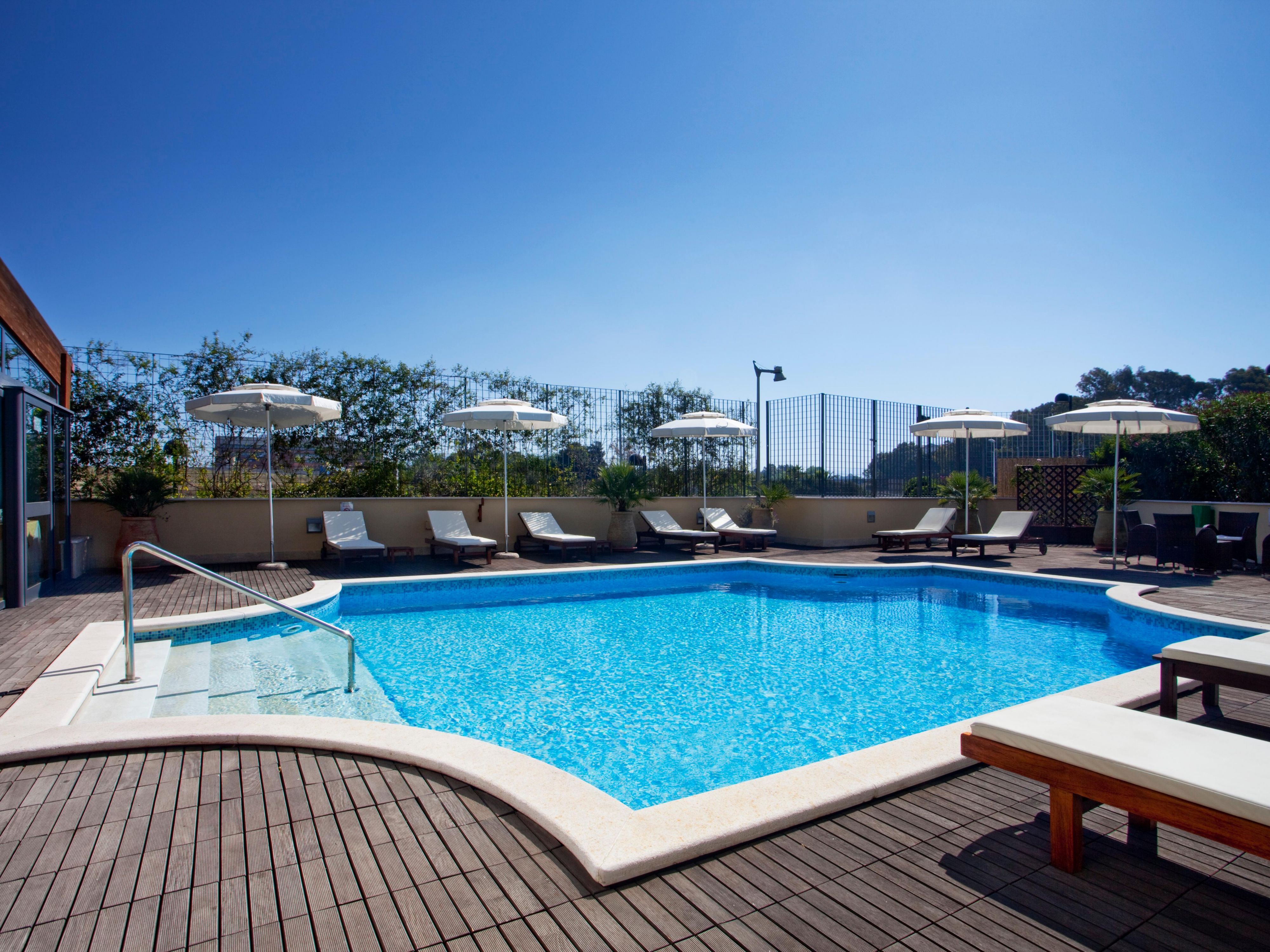 A small and private swimming pool in a private garden of the hotel will make waiting moments more pleasant