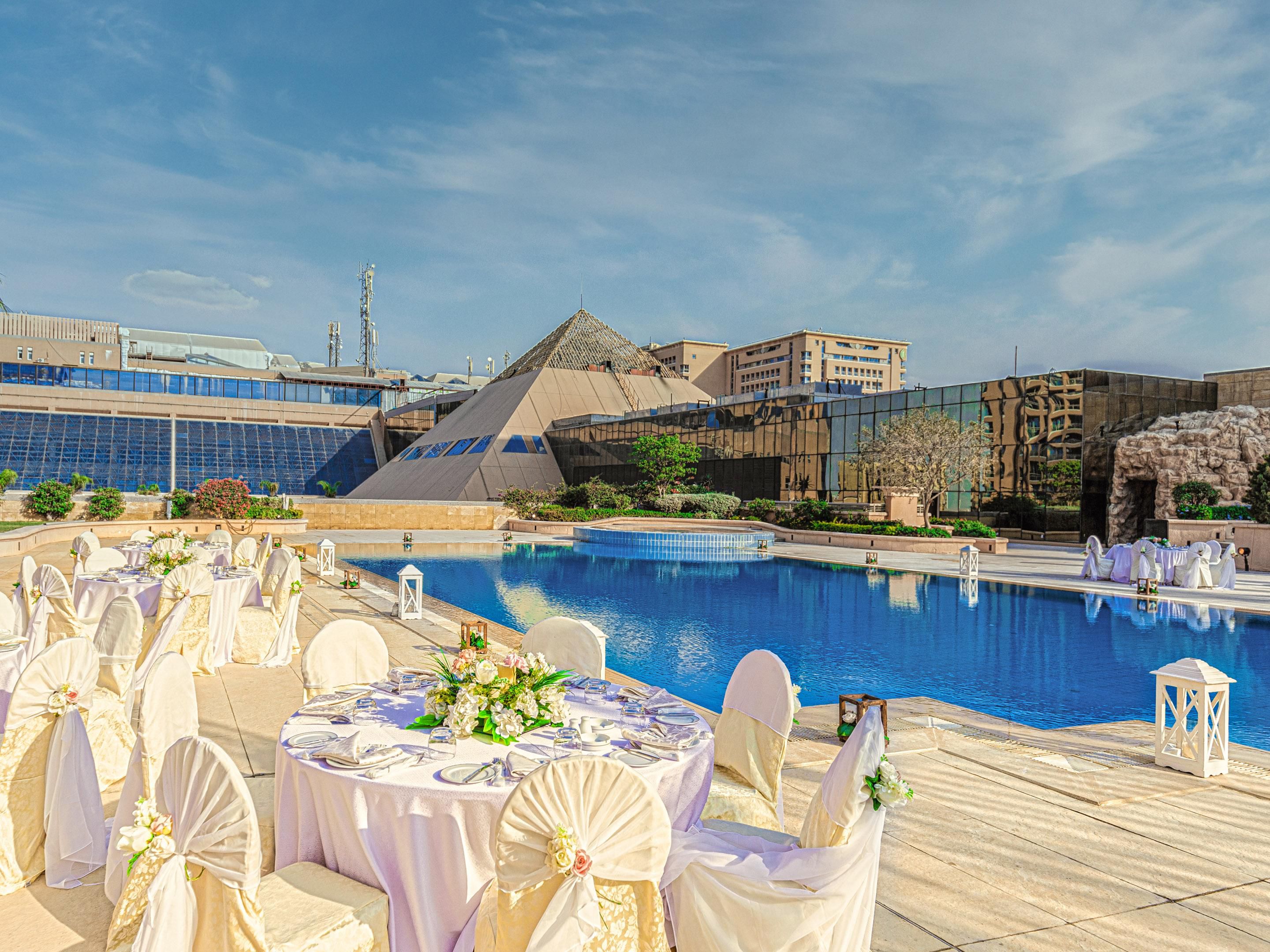 Celebrate your wedding at the Atrium, the ultimate destination for unforgettable moments with a stunning view of Cairo. Located on the rooftop of Holiday Inn Citystars, the Atrium offers an expansive space, perfect for grand weddings and special events,  providing a breathtaking backdrop for your special day.