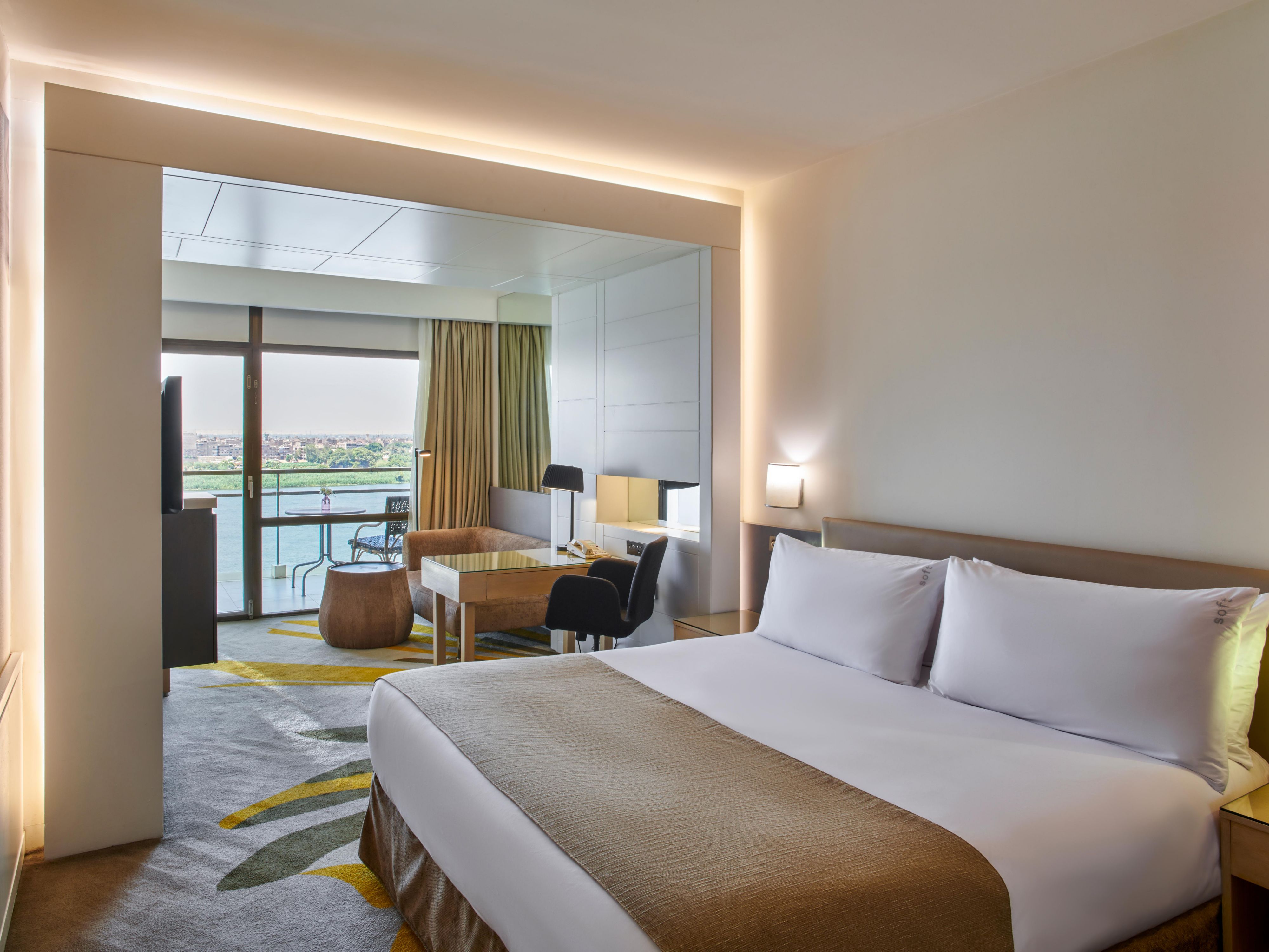 Experience the charm of our Nile View, your cozy home away from home. Step onto your private balcony and revel in breathtaking vistas of the Nile. Enjoy unmatched comfort and amenities, perfect for romantic escapes or leisurely retreats. Book now and create memories to cherish forever!