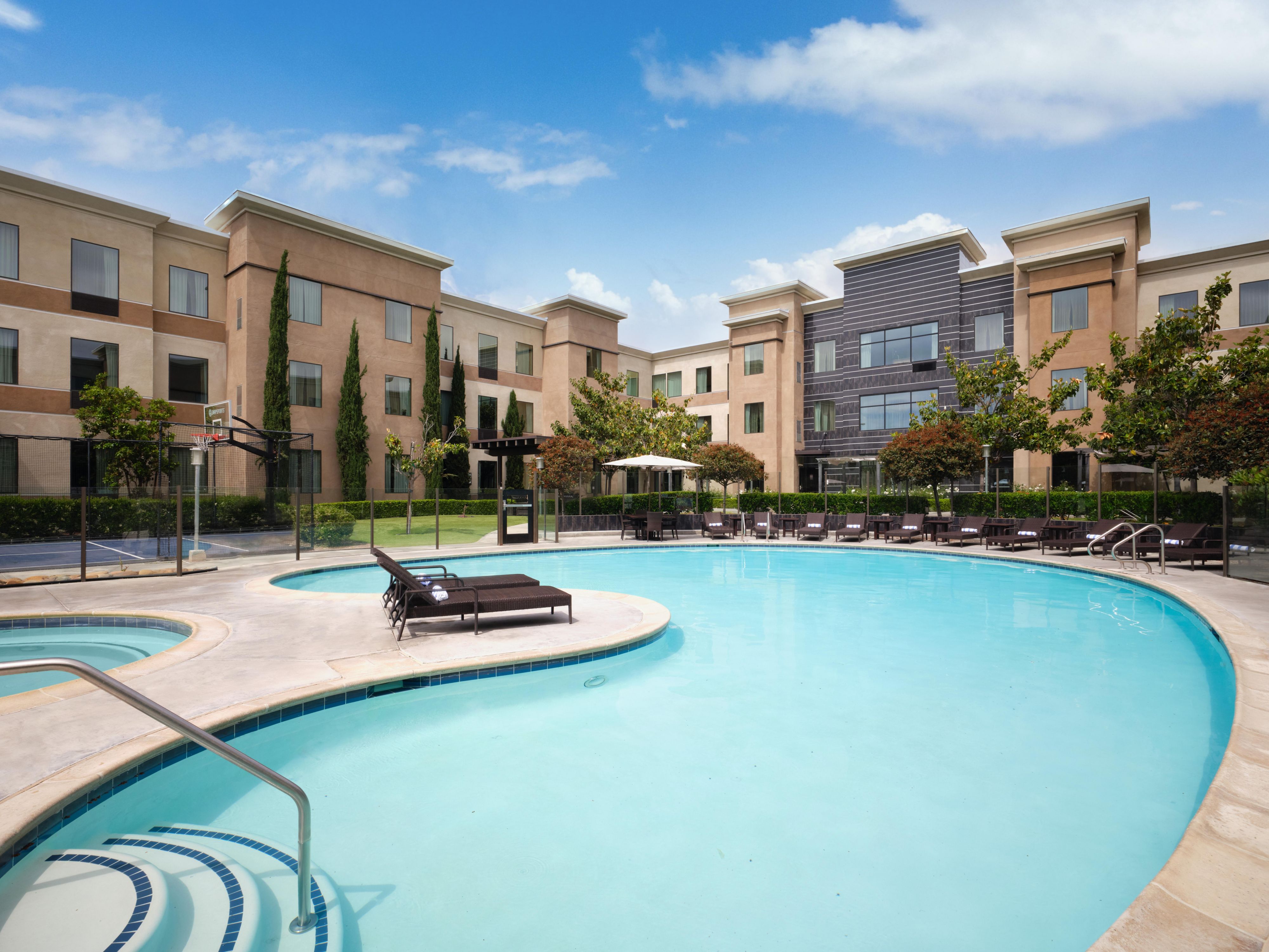 Enjoy on site dining and EV chargers at our Carlsbad hotel, with fast WiFi and a fitness center available for added convenience. Relax by the outdoor pool with a basketball hoop and jacuzzi, close to San Diego beaches and LEGOLAND California.