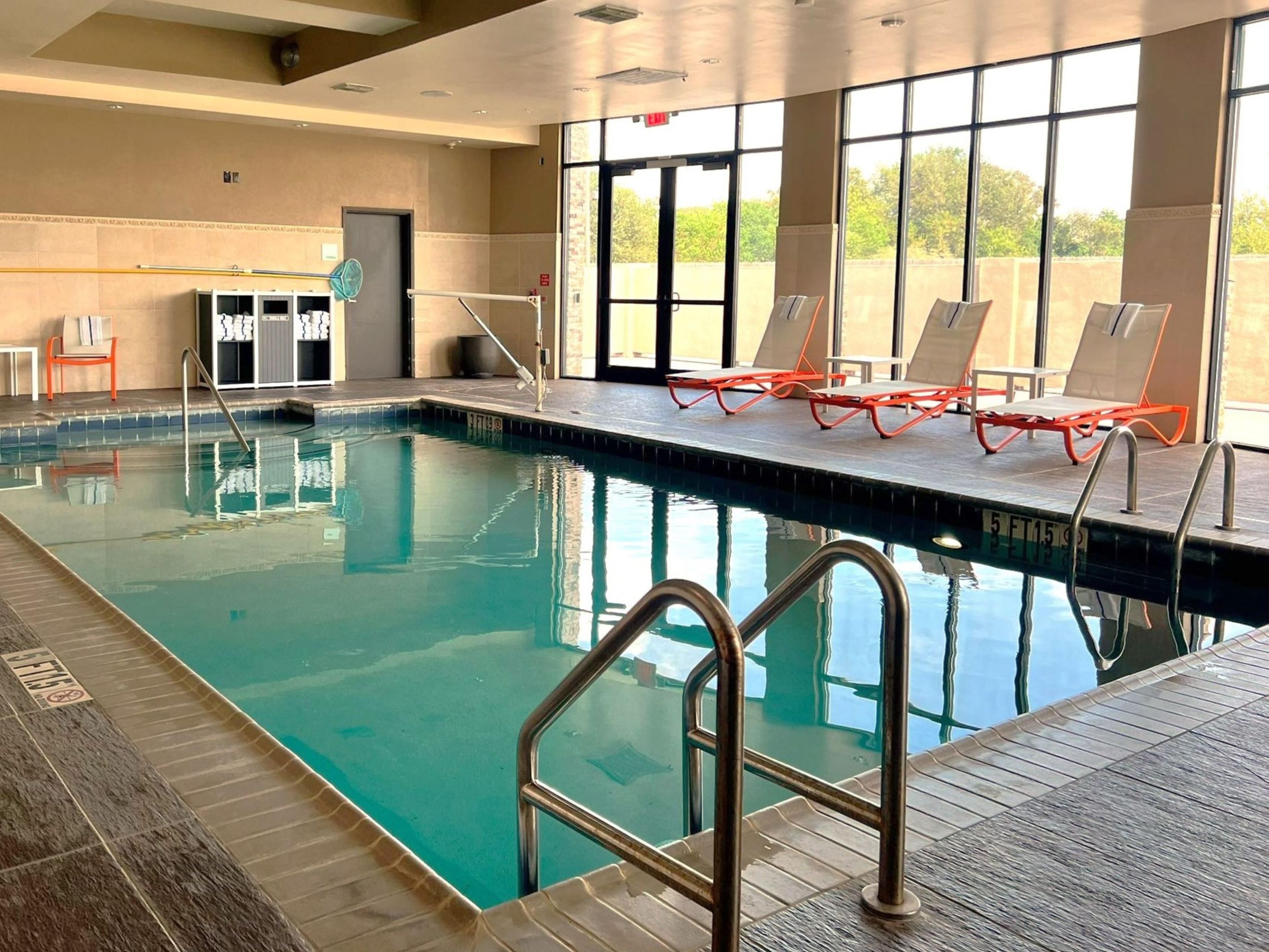 Elevate your stay in Channelview with amenities that matter. Stay active in our Fitness Center and productive in our Business Center. Take a dip in our indoor pool and enjoy dining at Time Out Sports Bar and Grill, where kids under 12 eat free. From free Wi-Fi to free parking and EV charging stations, we offer more perks for a memorable stay.