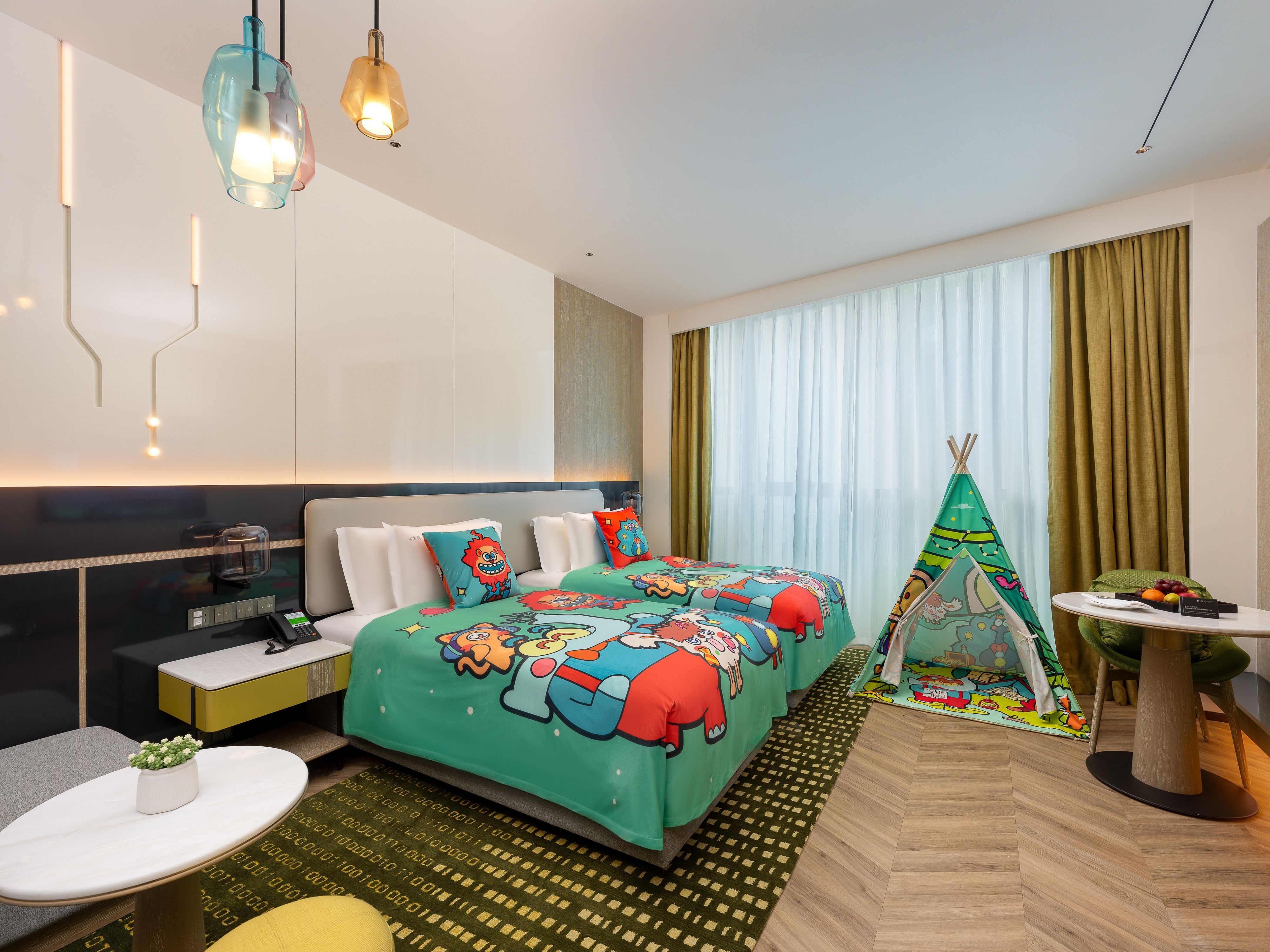 Far away on the planet Smile, the locals use Smile Value potions to breed perfect little monsters. But one day, the potion malfunctioned and five little monsters with no smile value were born. The hotel has 3 different styles of Little Monster themed rooms where kids can experience different themed interactive play experiences and earn rewards.