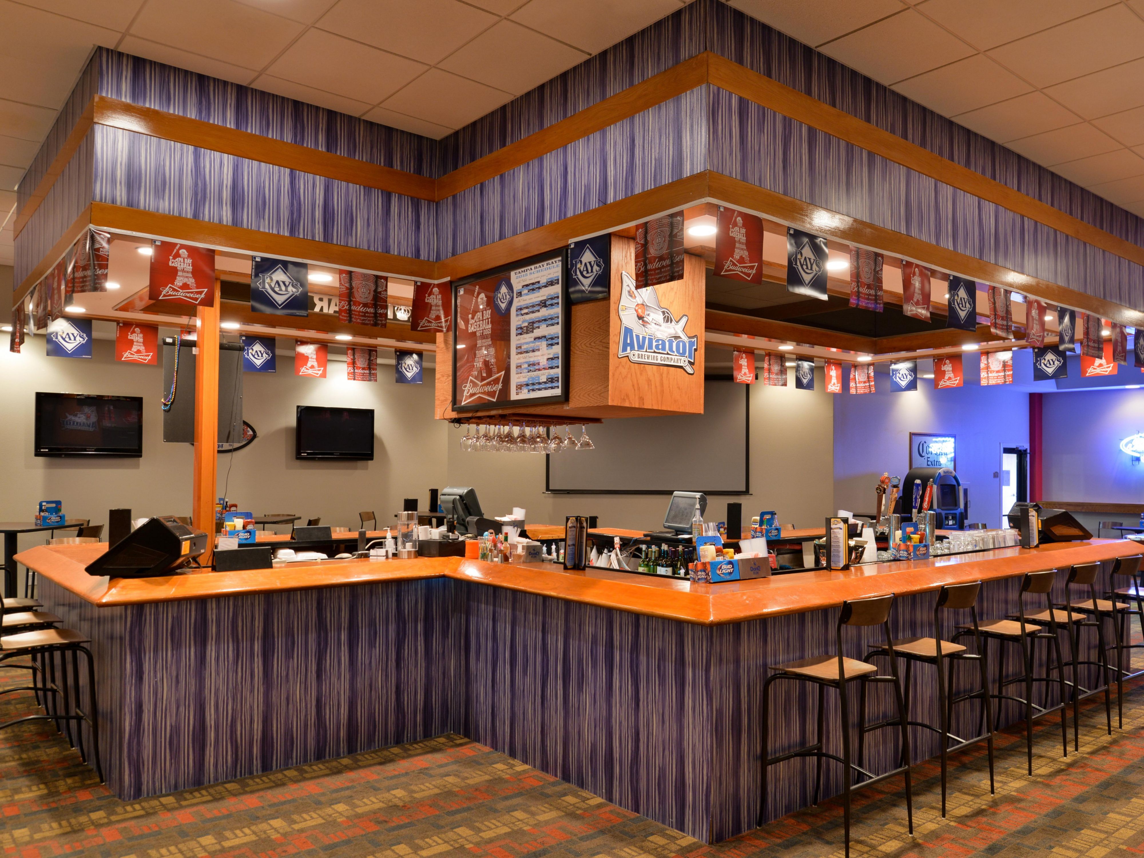 End your day with a cocktail at our Aviators Tavern! Enjoy a fun and relaxing atmosphere with a drink special and serving "American Cuisine". Watch your favorite game on one of many TV's, Game of Pool or Jenga. Located on the first floor of the hotel. 