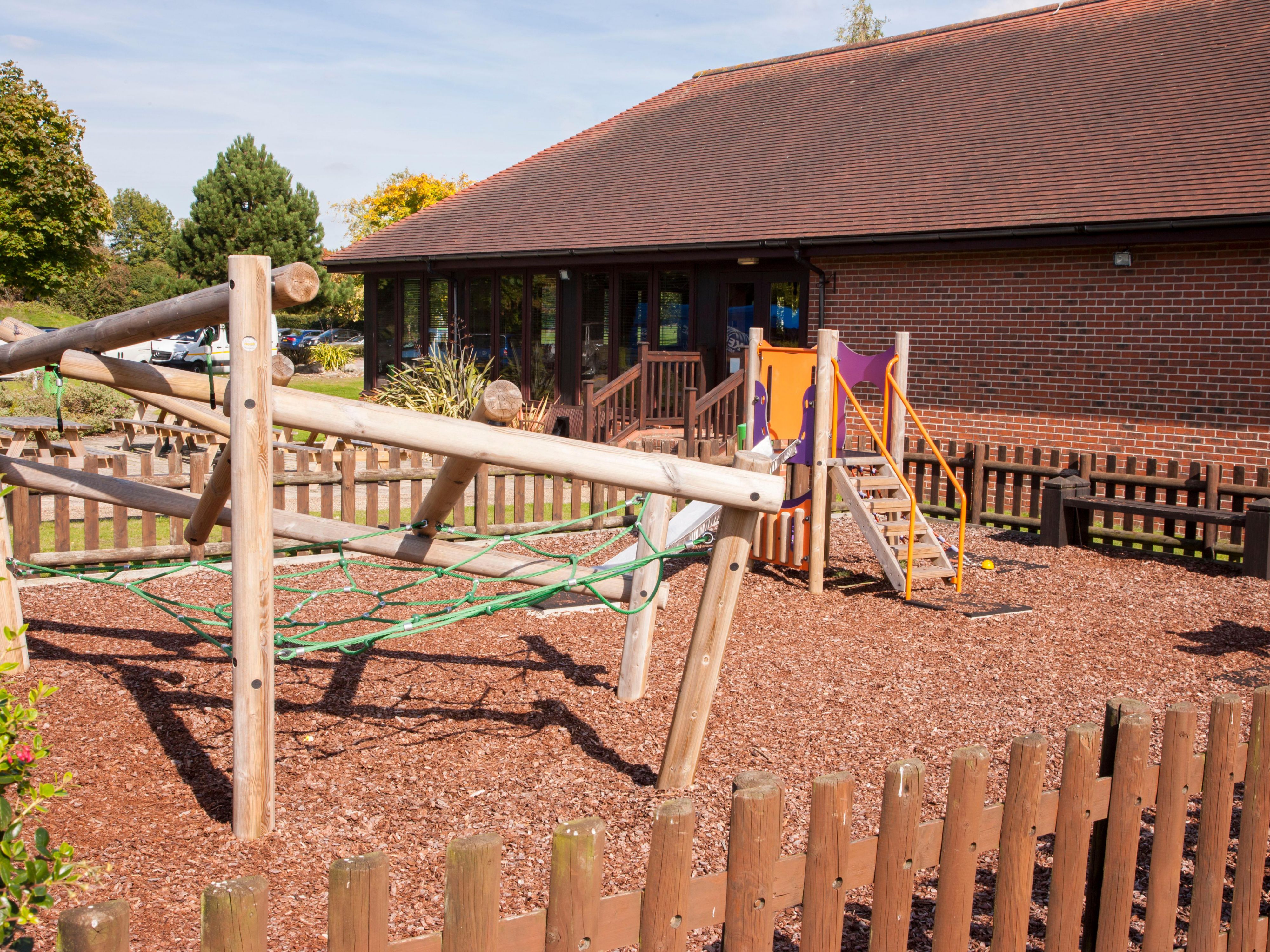 At Holiday Inn Colchester, children can enjoy an exciting outdoor play area that includes a fun climbing frame and assault course. It's the perfect spot for young guests to burn off energy while parents relax nearby. The play area adds a family-friendly touch to the hotel's outdoor amenities.