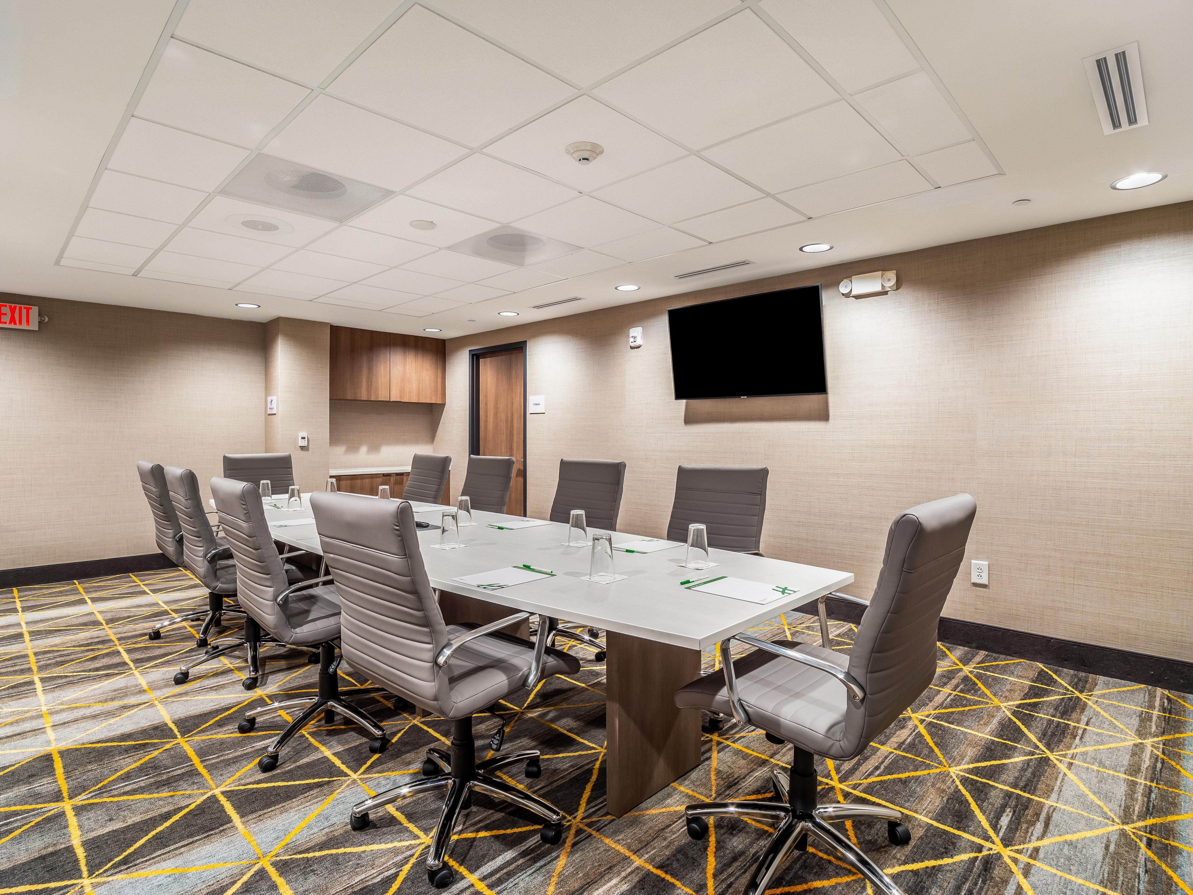 Gather with friends or business associates in our boardroom. With space for up to 15 attendees, our meeting room offers a 50' HDTV with screen mirroring capabilities, multiple outlets, including outlets in the boardroom table, and phone & Ethernet in the room. Attendees will stay comfortable in our ergonomic rolling chairs.