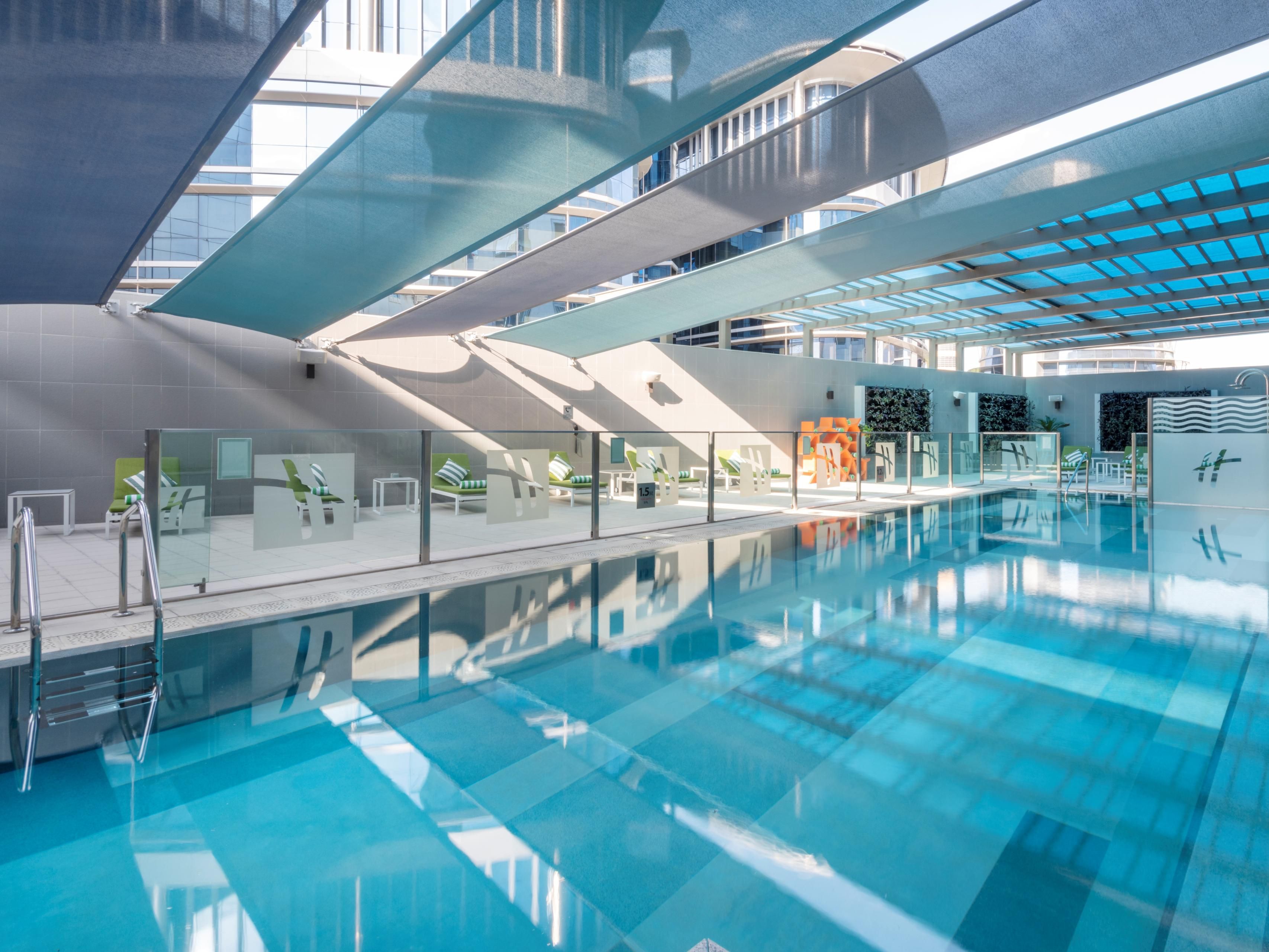 Relax poolside or swim laps in our outdoor swimming pool