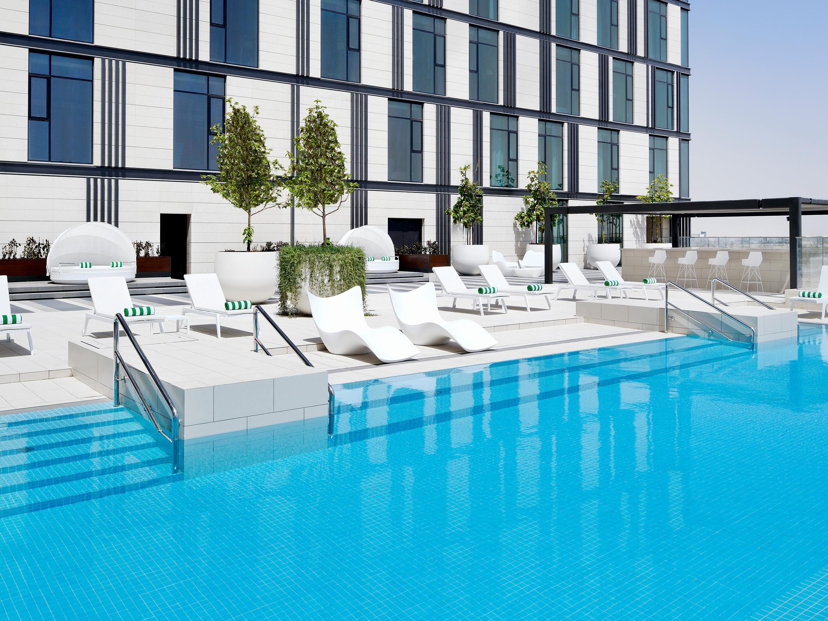 Soak up the sun at our Pool Bar & Lounge