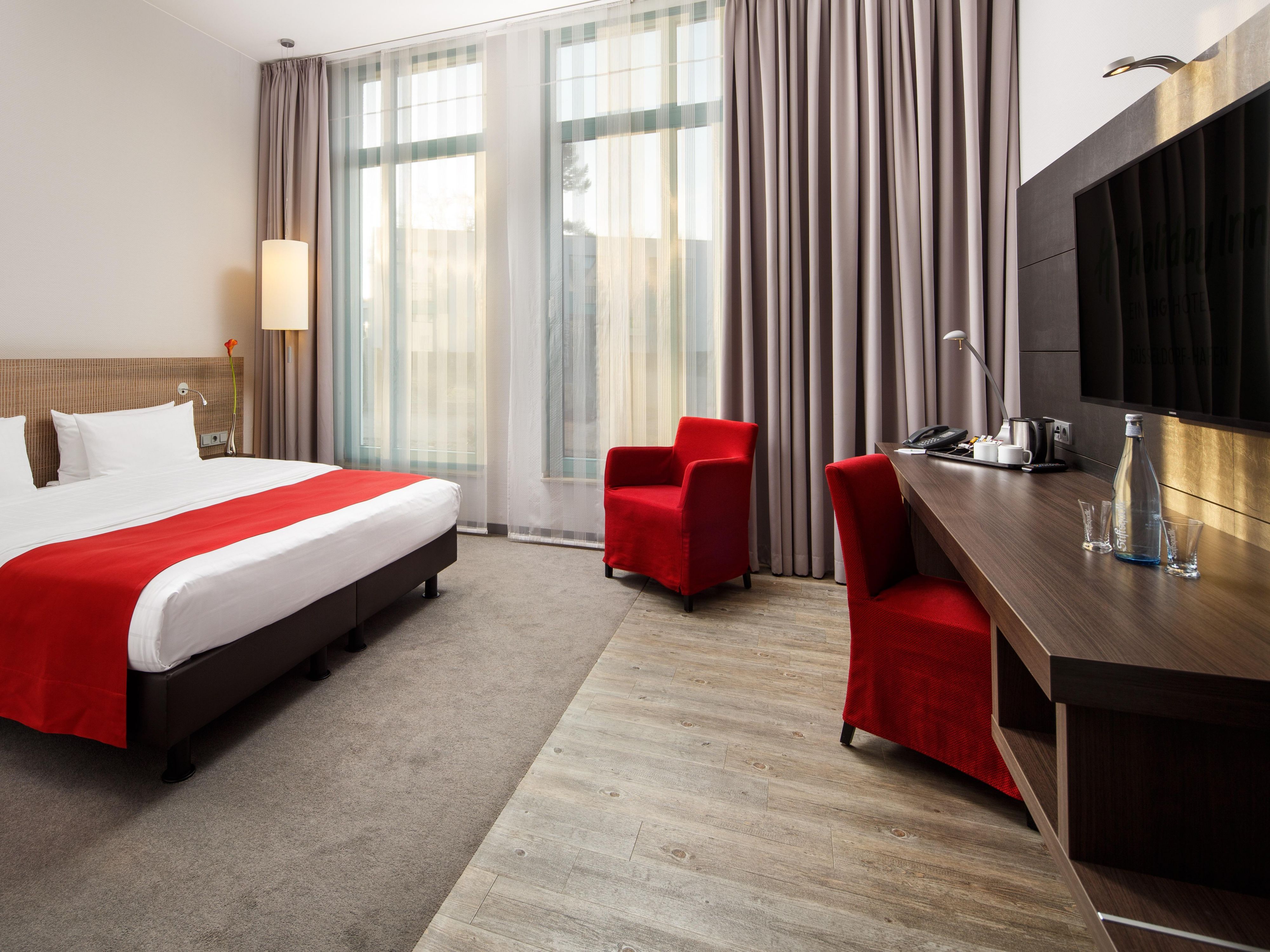 A smartly designed guest room with lovely views of the courtyard.