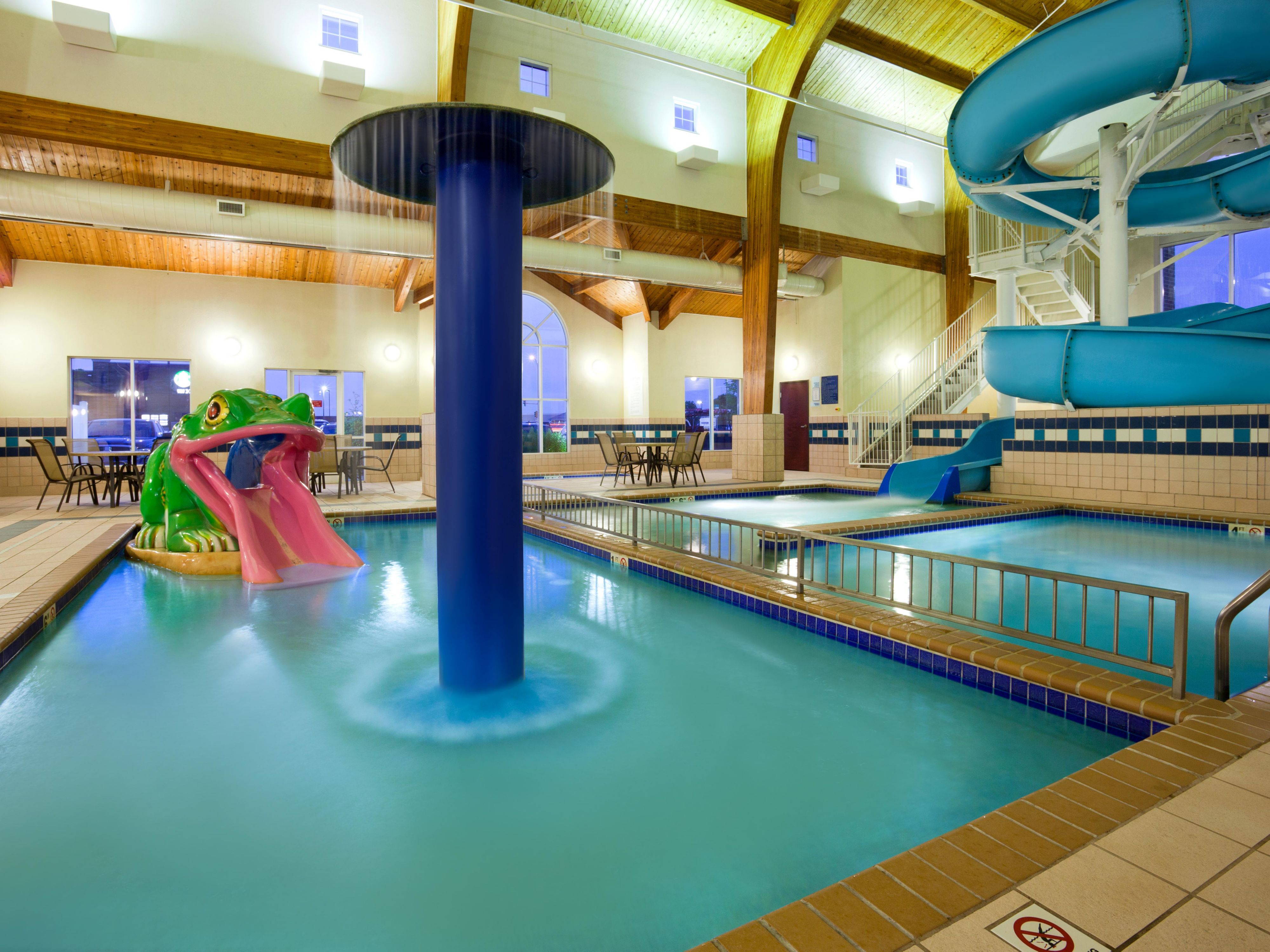 Our hotel comes equipped with an impressive water recreation area, providing fun for all ages. Our indoor pool features a 150 ft water slide, two whirlpools, and a kid's zone. For our guests' convenience, the hotel pool and water slide are open year-round. No matter the season, enjoy the accessibility of our refreshing pool area. 