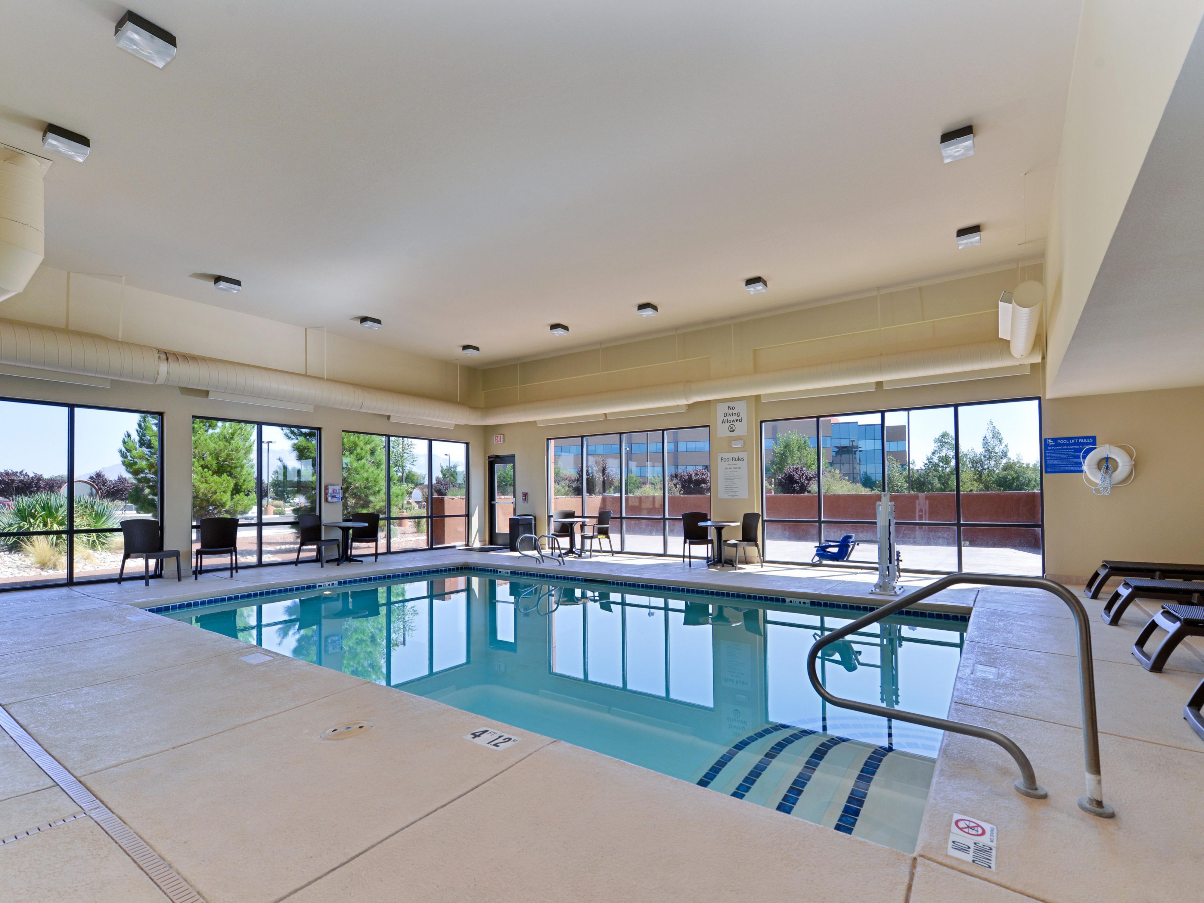 Enjoy a refreshing dip in our heated indoor pool. Whether you need a break from work or an invigorating swim, our pool fits the bill. Visiting our Albuquerque hotel with family? Poolside lounge chairs make it easy for you to relax by the water and watch the kids play.