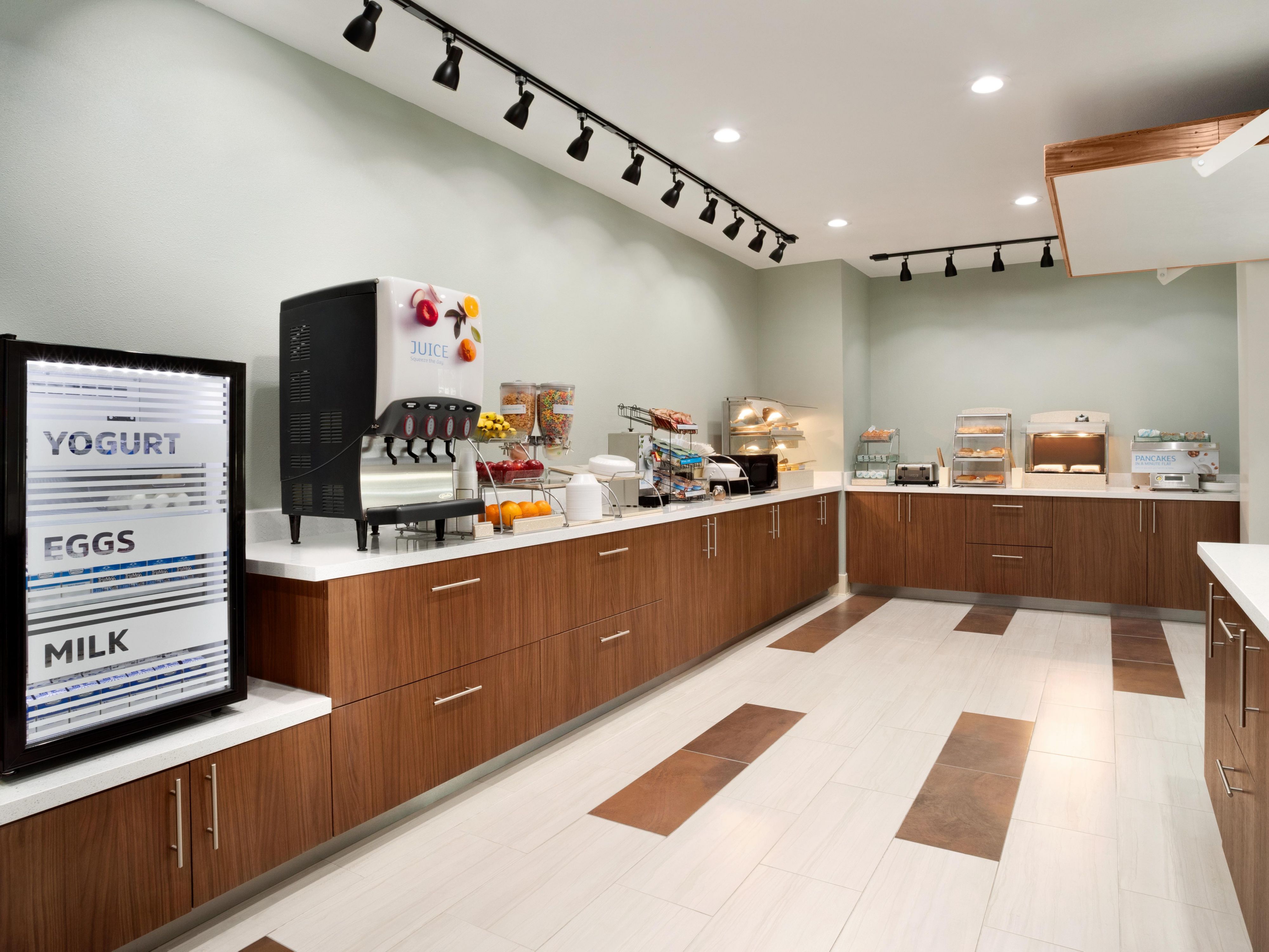 Our complimentary Express Start Breakfast bar offers a wide variety of hot & cold options including a rotation of egg & meat selections, biscuits or muffins, fruit, our famous cinnamon rolls & Smart Roast coffee.  Did we mention our one-touch pancake machine or our freshly cooked oatmeal kettle? You have to see it for yourself!  