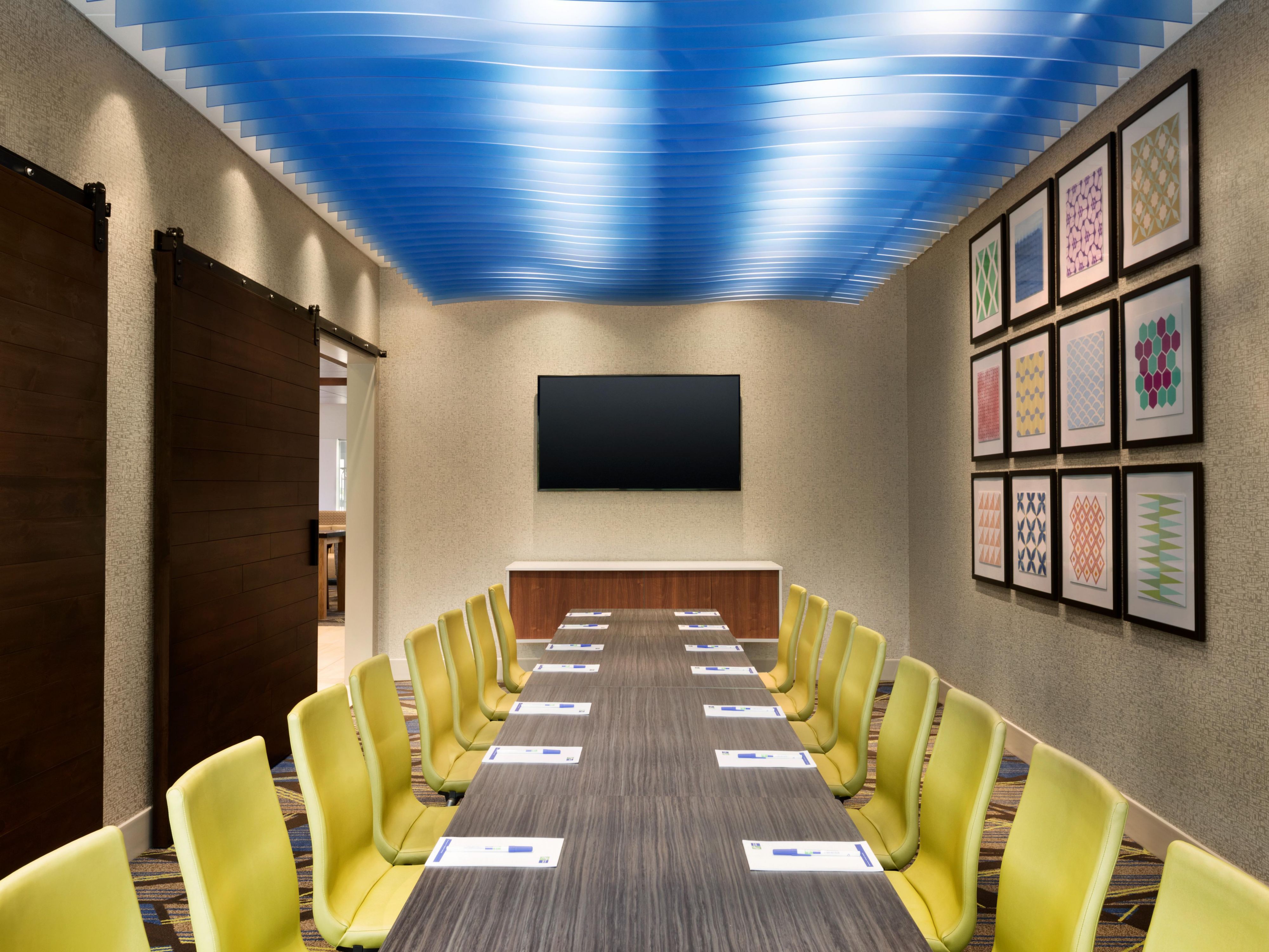 Host your next small gathering at our hotel in Allen Park, MI. Our meeting space can accommodate 15 people and is perfect for a board meeting, baby shower, or intimate birthday party. With colorful artwork and ergonomic chairs, our board room will keep you energized and productive.