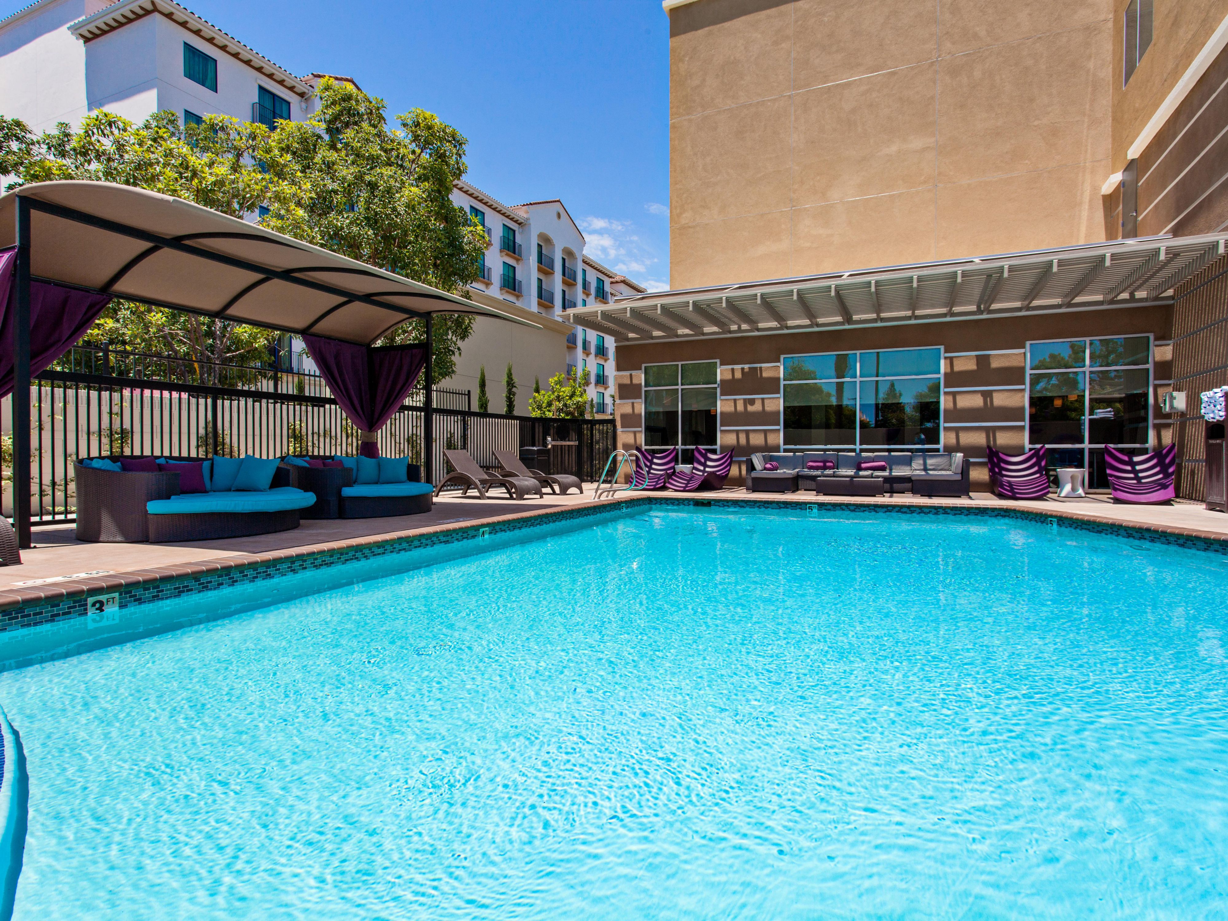 Check out our beautiful outdoor pool and whirlpool! It's a beautiful area to read the paper with a cup of coffee in the morning, swim in the hot afternoons, or relax in the outdoor hot tub after a day out and about at Disneyland.