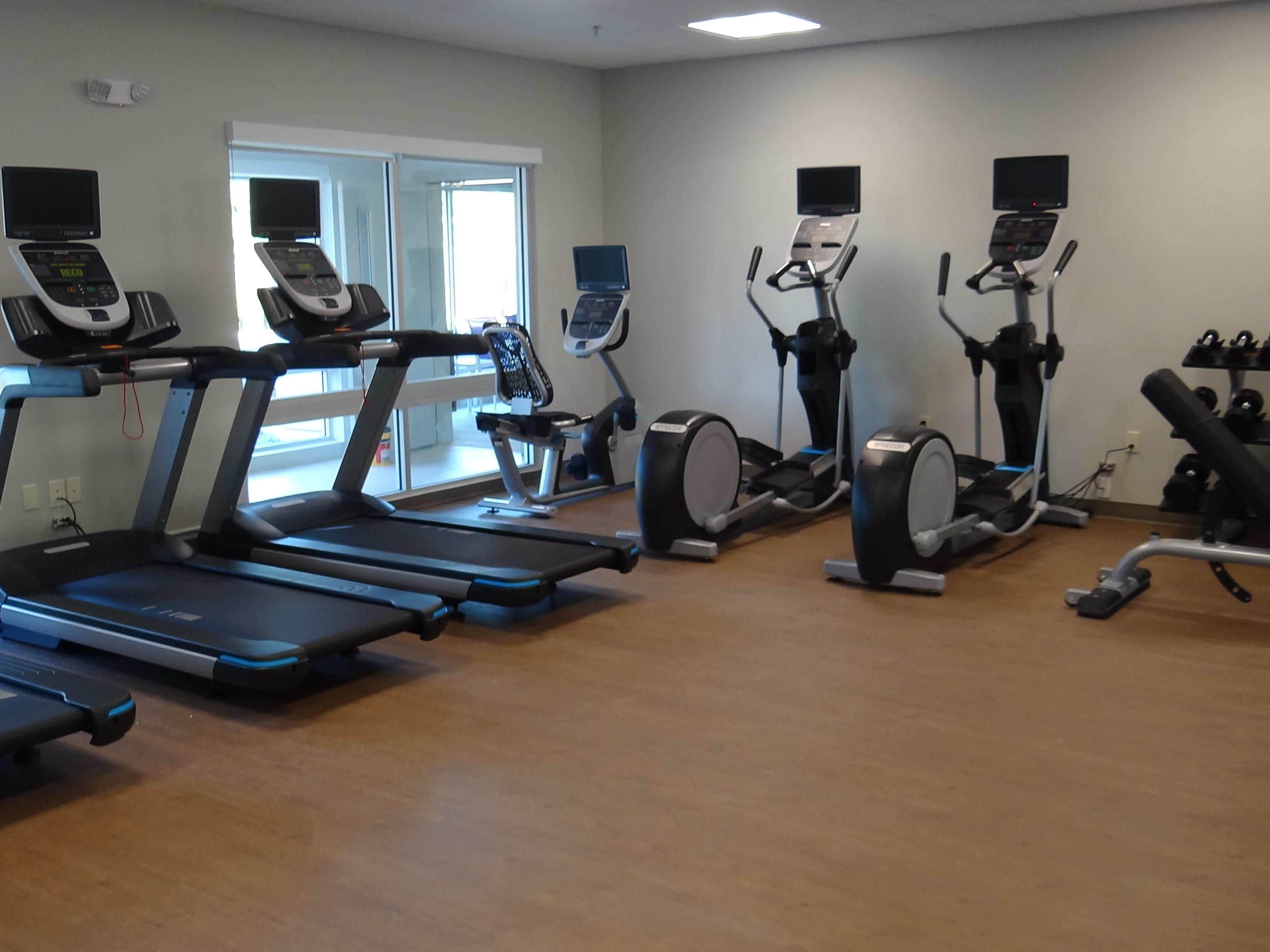 Get energized...work out with the latest equipment in our large fitness center, featuring treadmills, elliptical, reclining bike, free weights and more!  Screens on each machine make it easy to program your workout for optimal results...or catch up on the latest news or your favorite show...to make your workout a breeze!