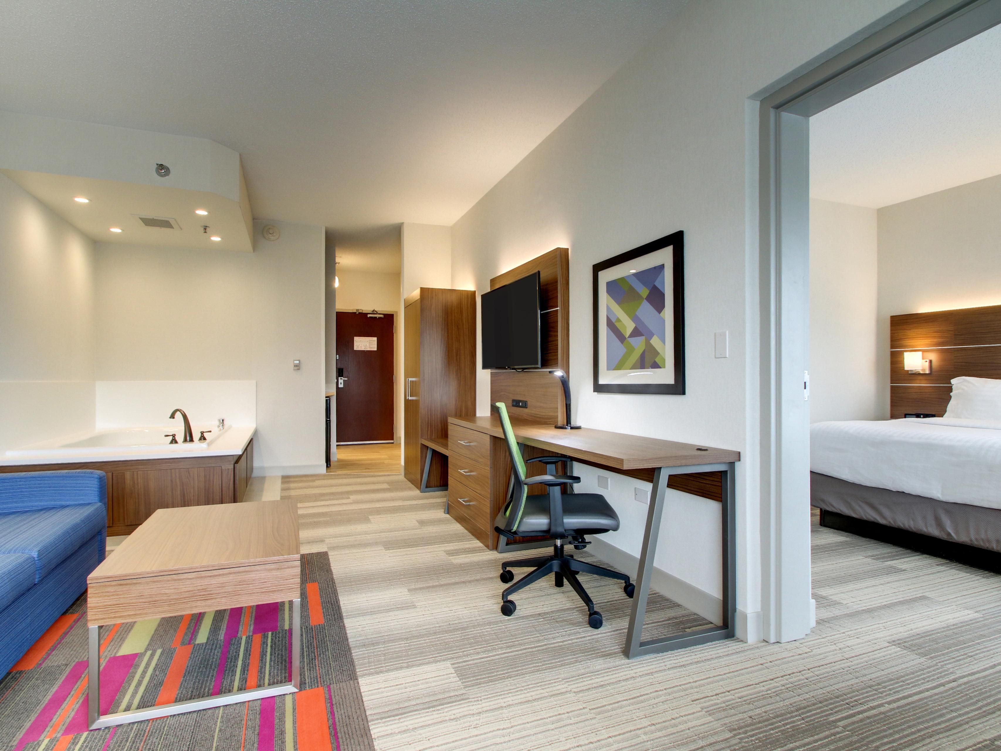 Enjoy a hot tub for two and a cozy fireplace in the bridal suite.