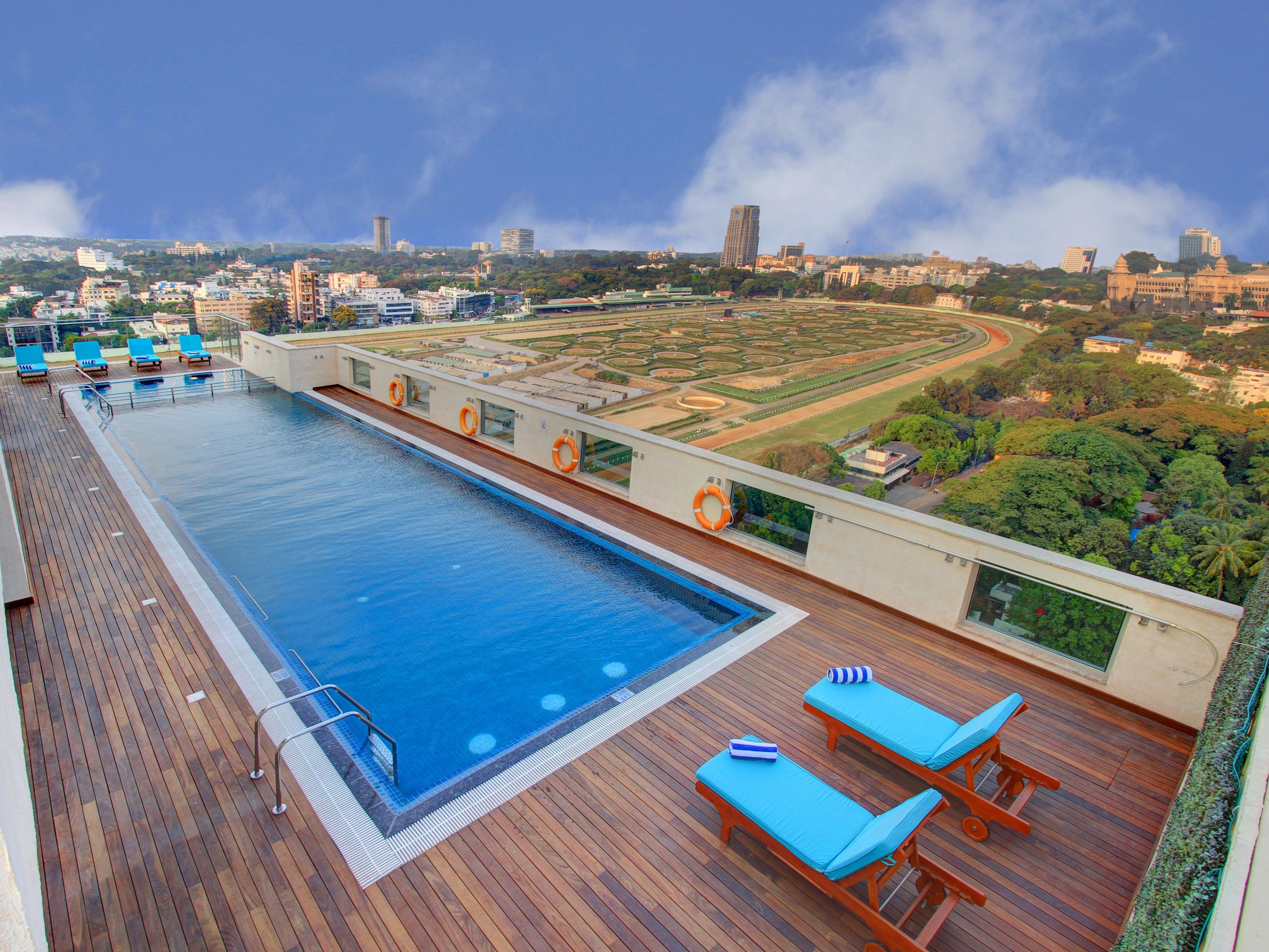 Take a sky high dip on our Roof Top open-air pool with sweeping Racecourse and Vidhana Soudha views Laze on sunbeds, chase sunsets, and unwind between laps at Holiday Inn Bengaluru Racecourse