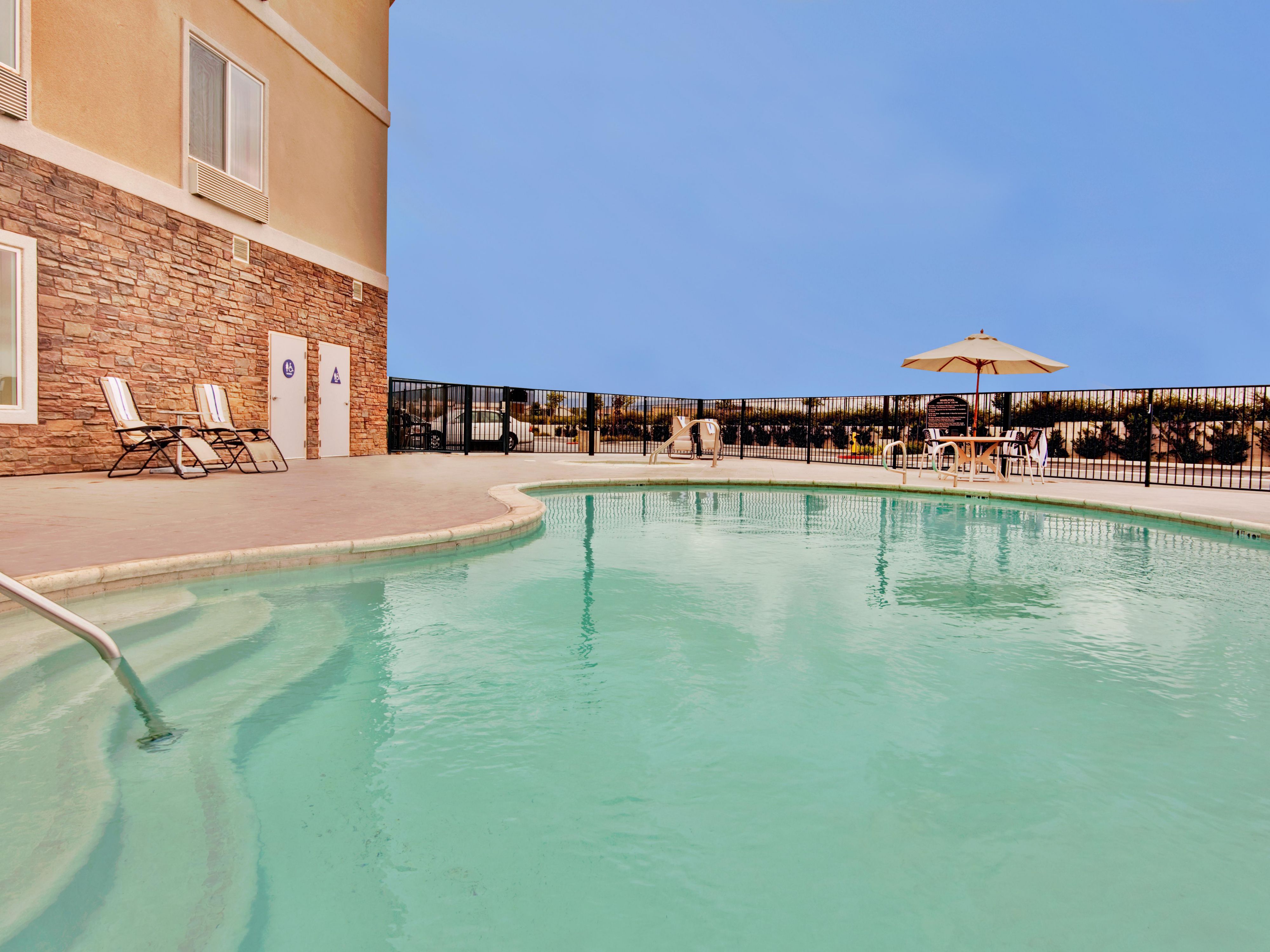 Take a dip in our sparkling outdoor pool under the California sun.