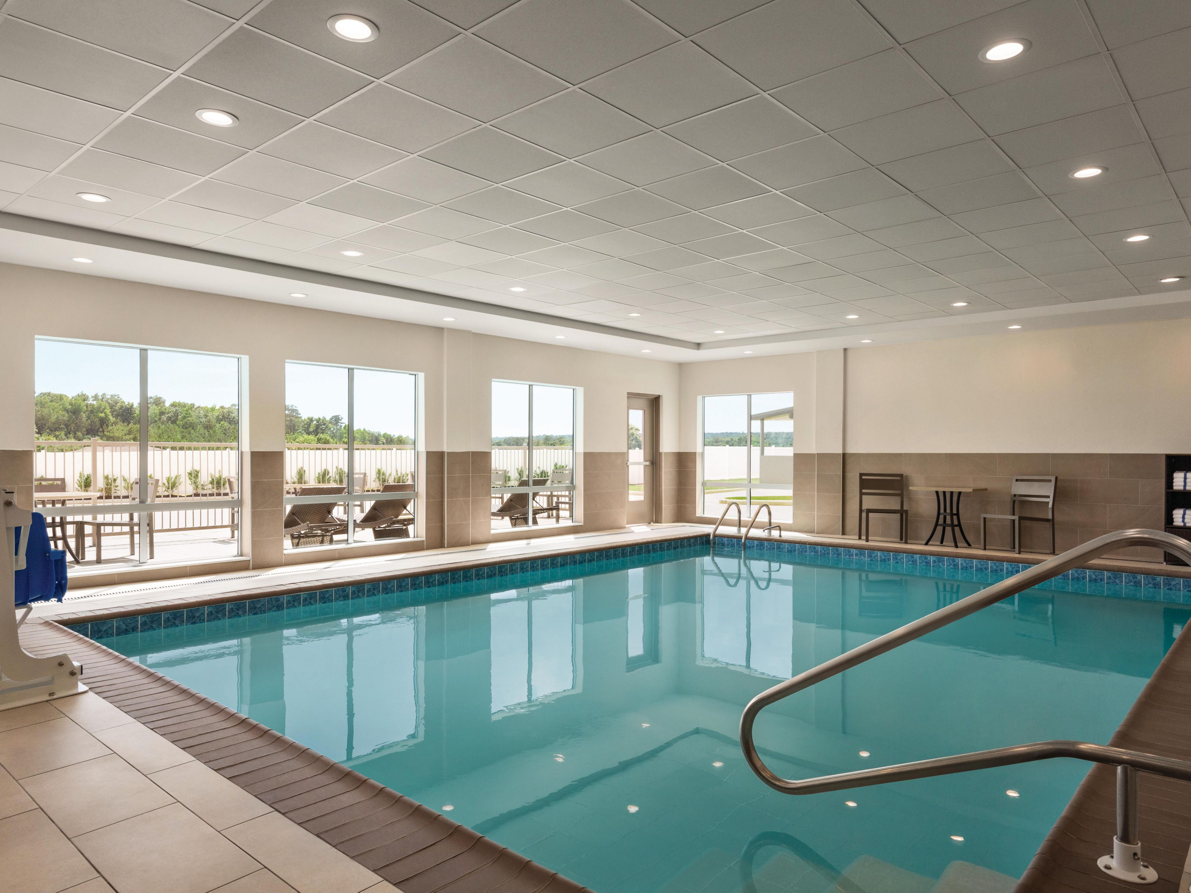 As a dual-brand hotel in Bessemer, AL, with an indoor pool, we offer double the amenities for double the enjoyment. Start your day with a complimentary Express Start® Breakfast, stay active in the Fitness Center, and unwind on outdoor patios featuring grills, a gazebo, and fire pits. Enjoy free gated parking, EV charging stations, and free Wi-Fi.