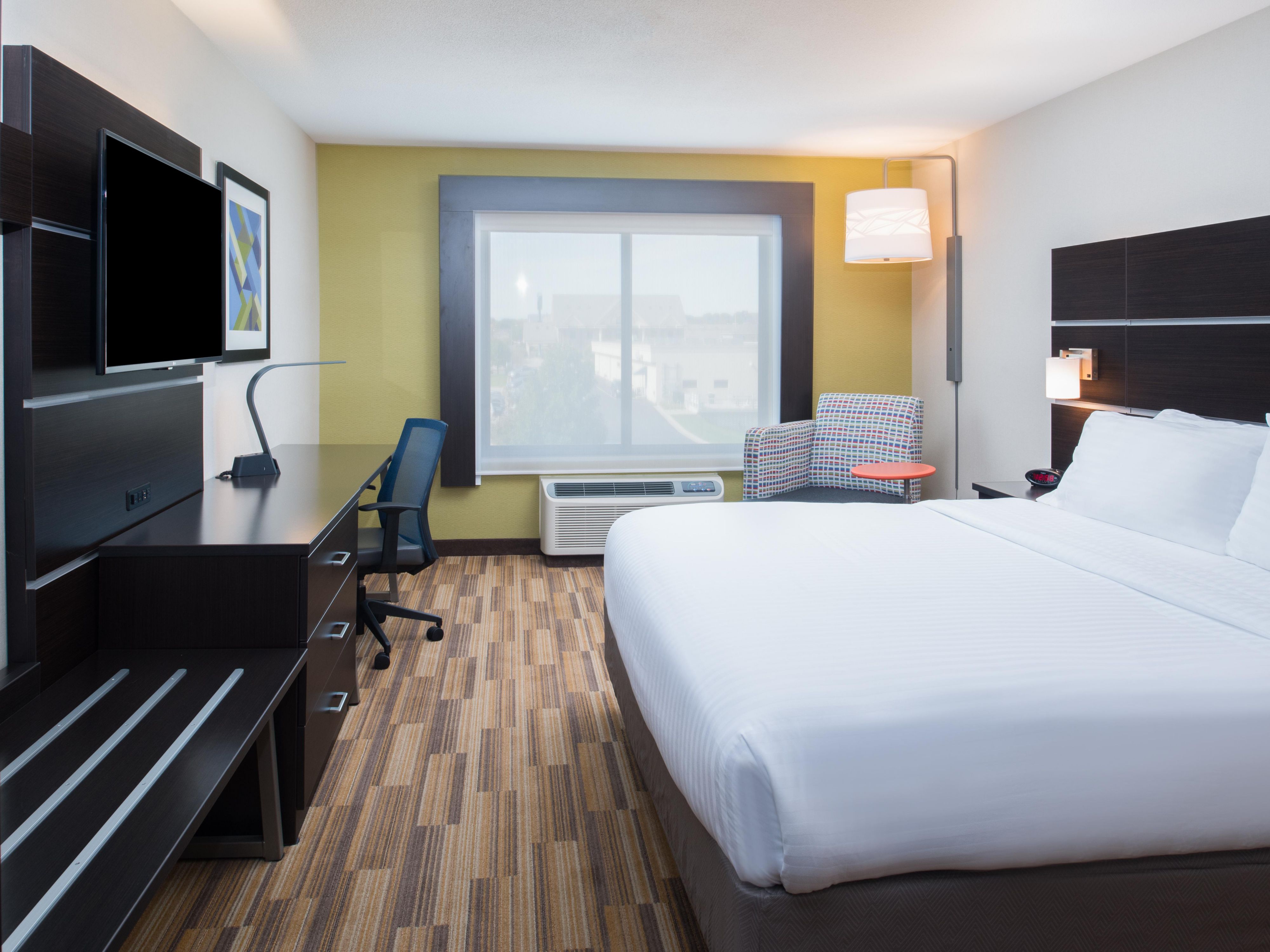 King Guest Room With Fridge and Microwave