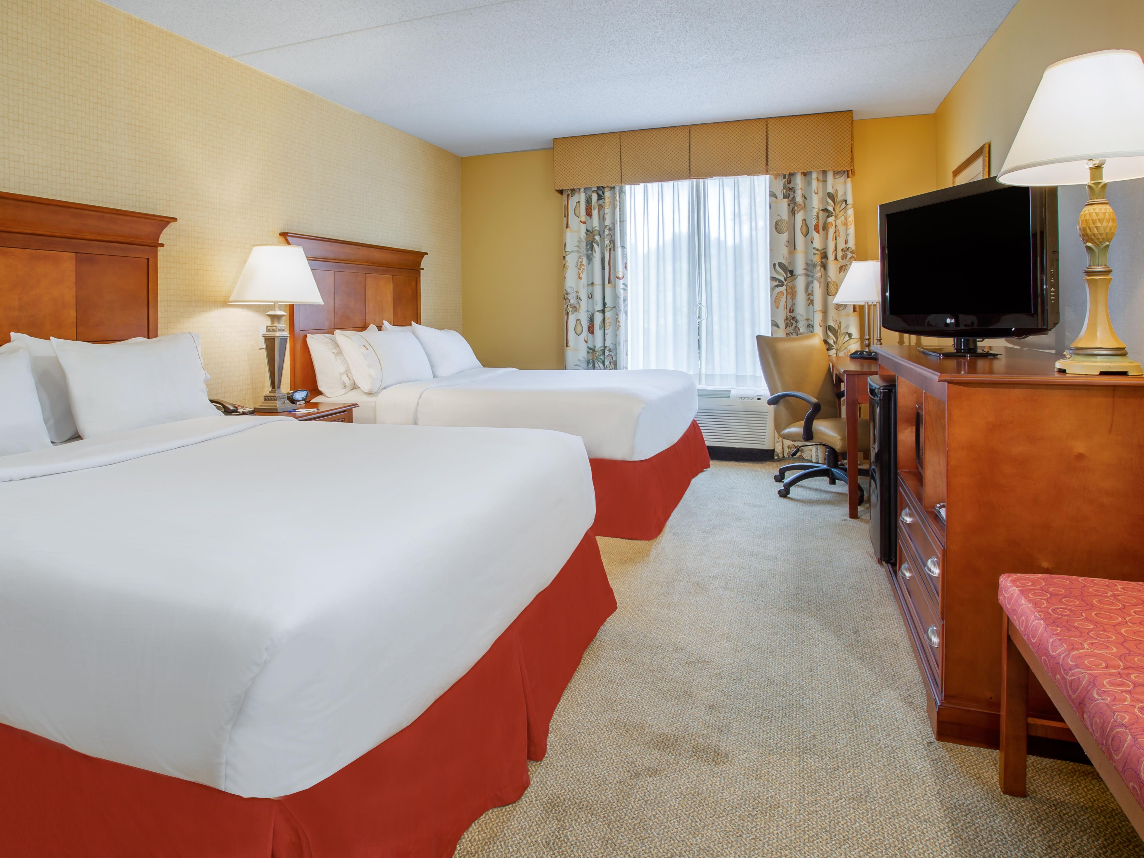 Our double queen bed guest rooms are ideal for family stays.