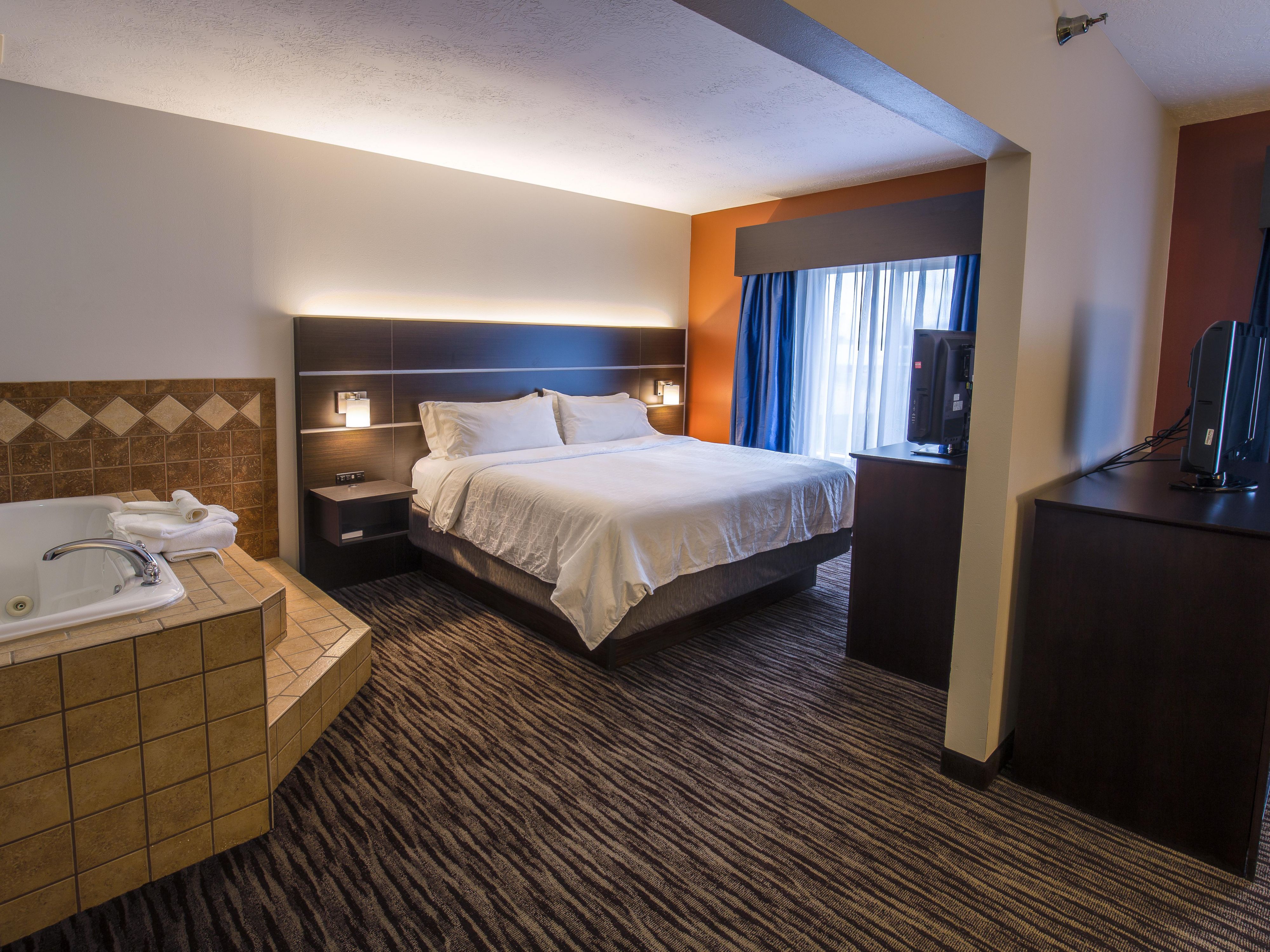 Unwind in our gorgeous King Jacuzzi Suite