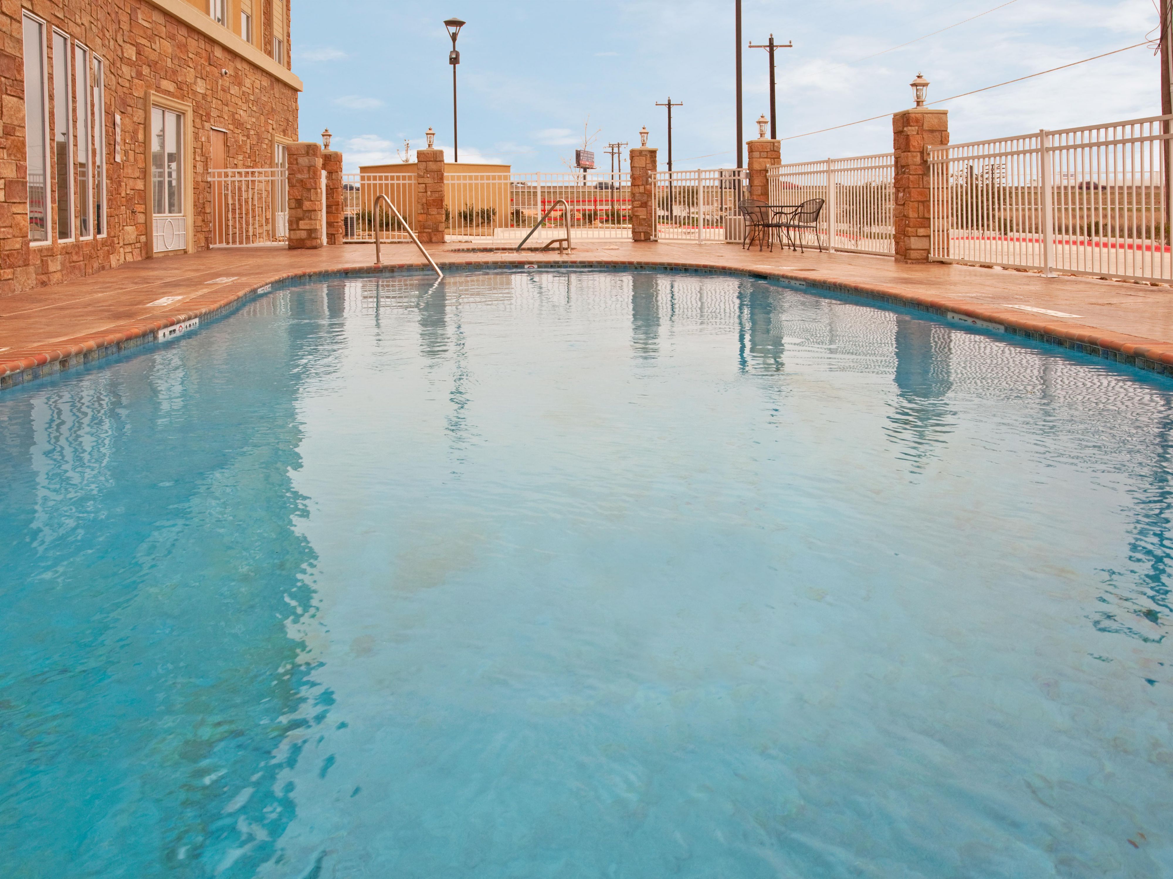 Our hotel in Buda, Texas, with complimentary breakfast, offers our guests all the essential amenities and more. Relax in our outdoor pool, enjoy the convenience of on-site parking, and stay active in our fitness center. Experience the essentials that matter most during your stay.