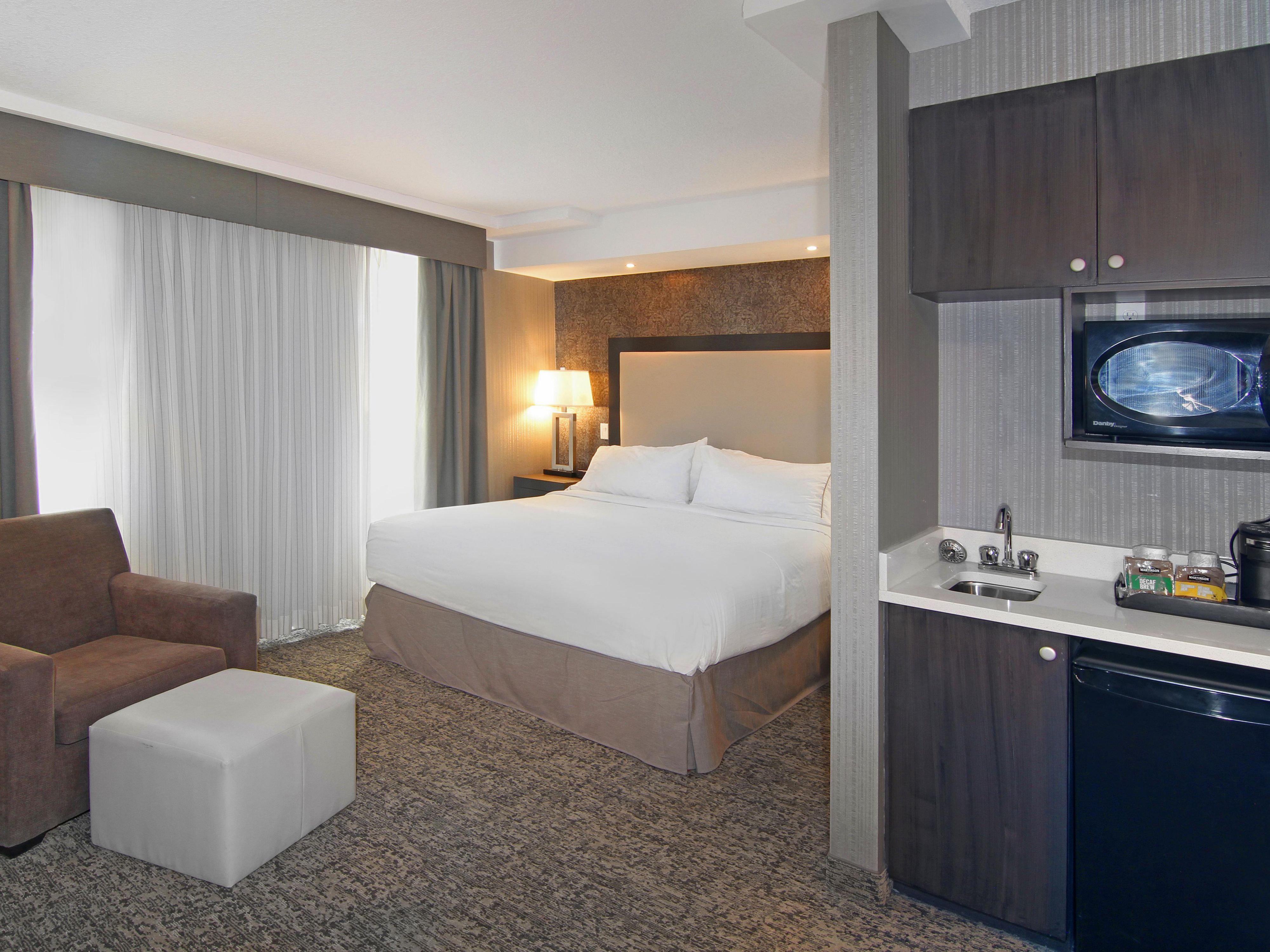 Refrigerator and microwave in each guest room