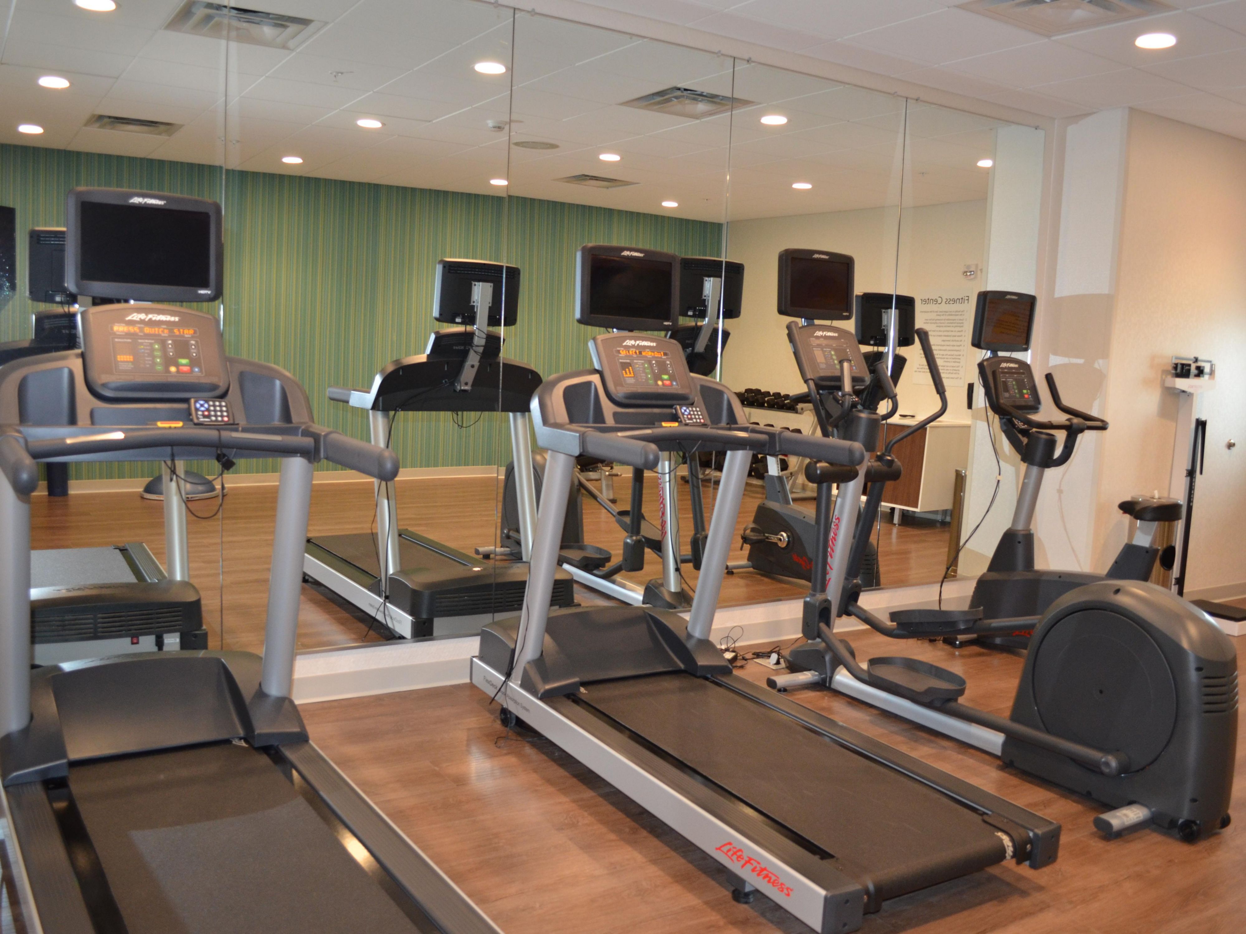 Start your day off feeling your best. Treadmills and elliptical now include their own individual television screens so you can choose what you watch while you work out! Hand weights, yoga mats, and medicine balls are available in our open workout area.

